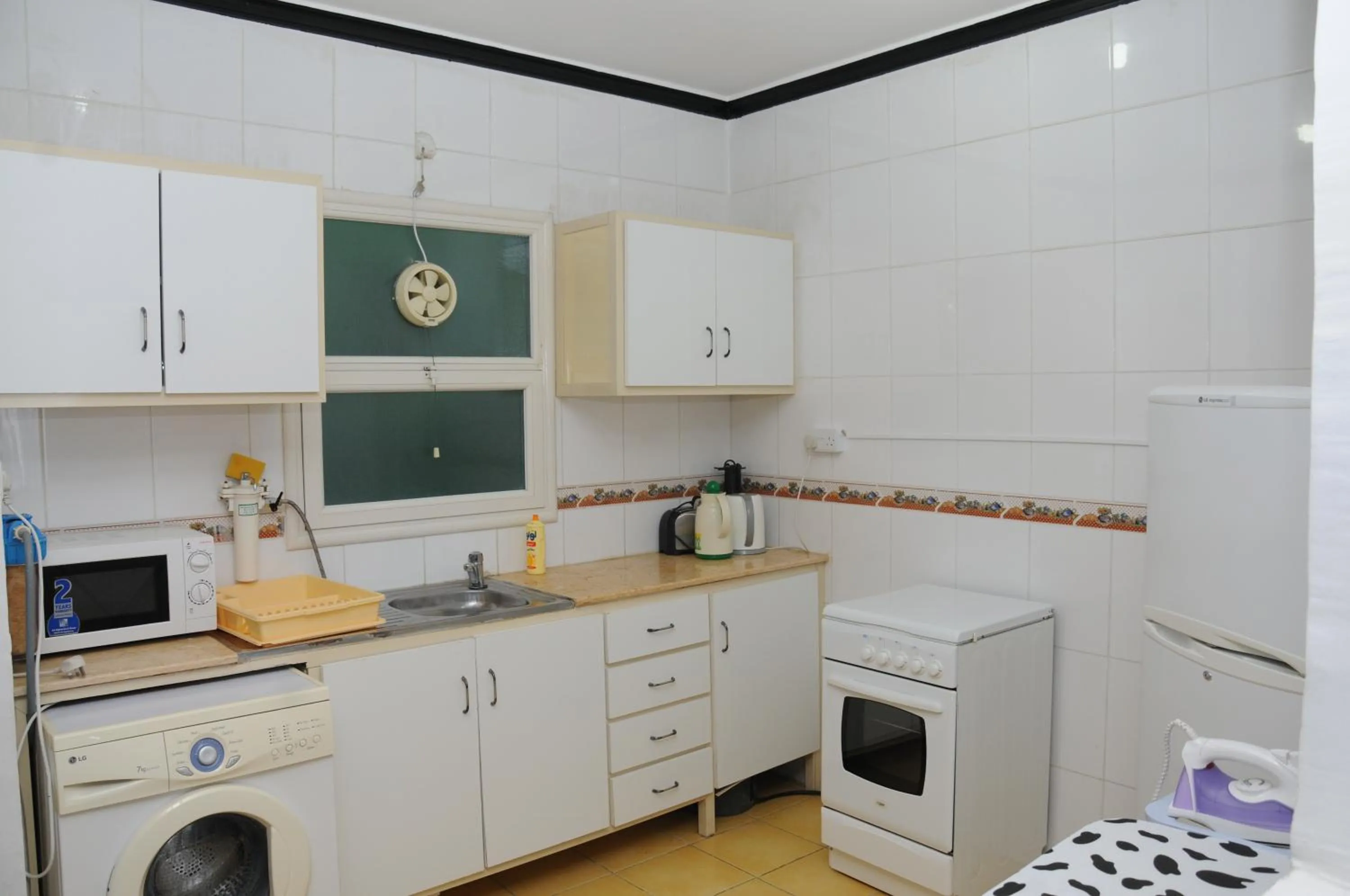 Kitchen or kitchenette in Arinza Tower Quality Apartments