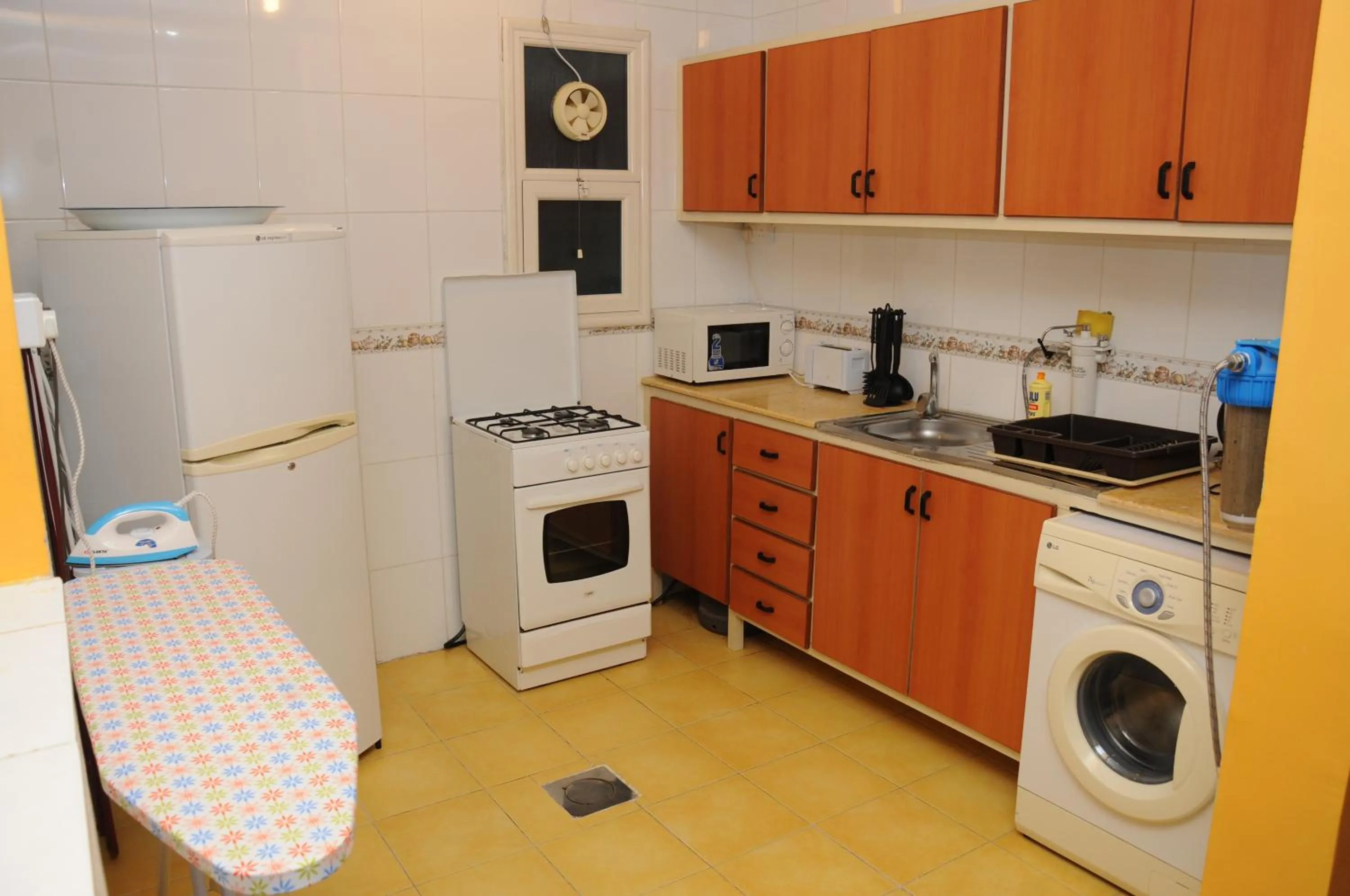 Kitchen or kitchenette in Arinza Tower Quality Apartments