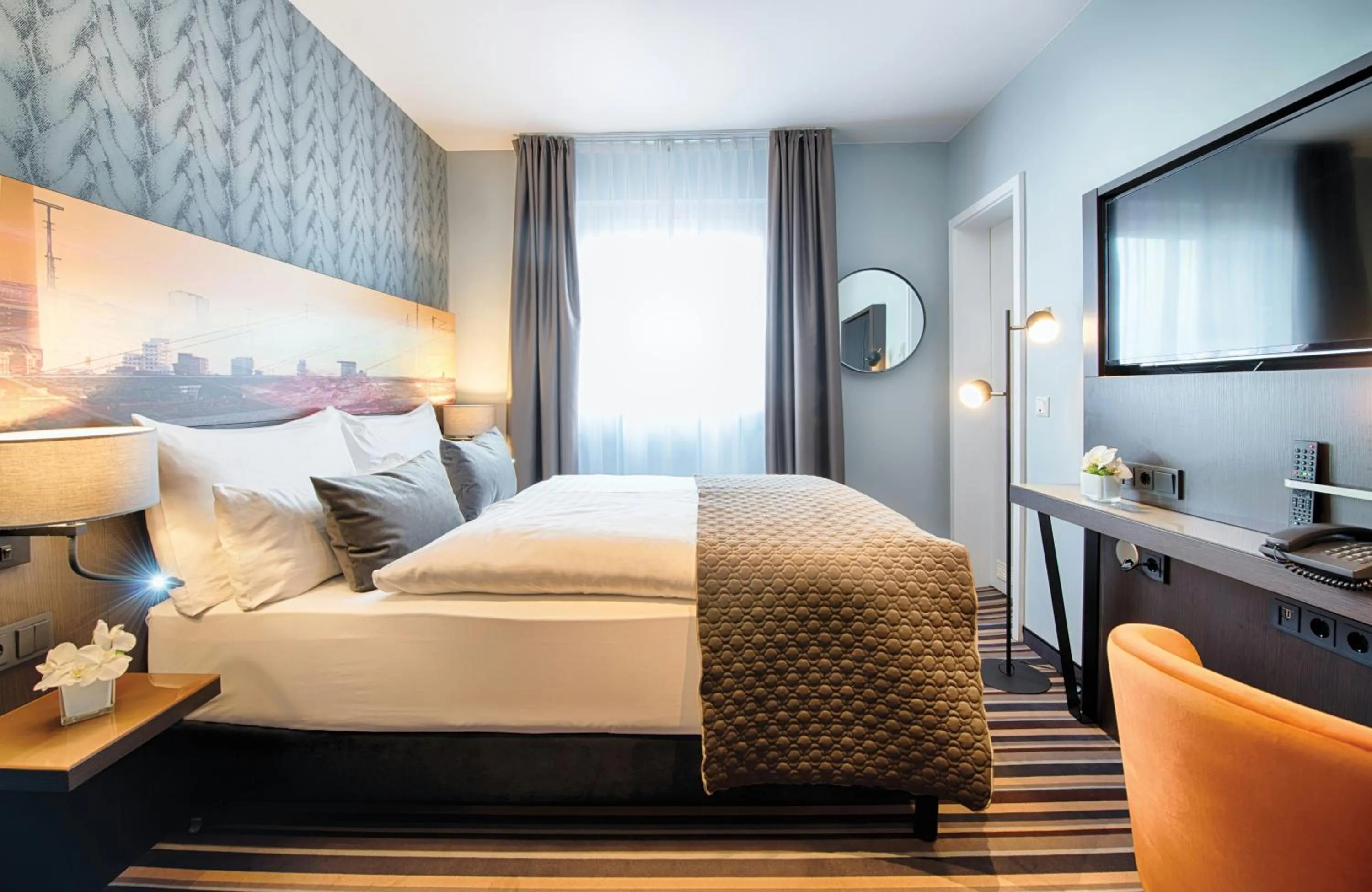 Photo of the whole room, Bed in Leonardo Boutique Hotel Düsseldorf