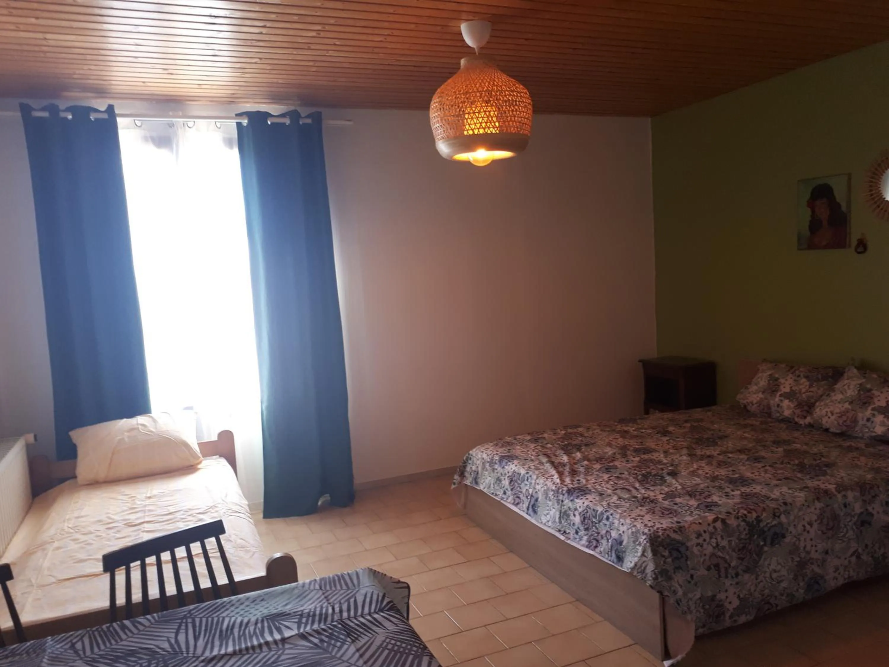 Bed in Leo's Chambres d'Hôte