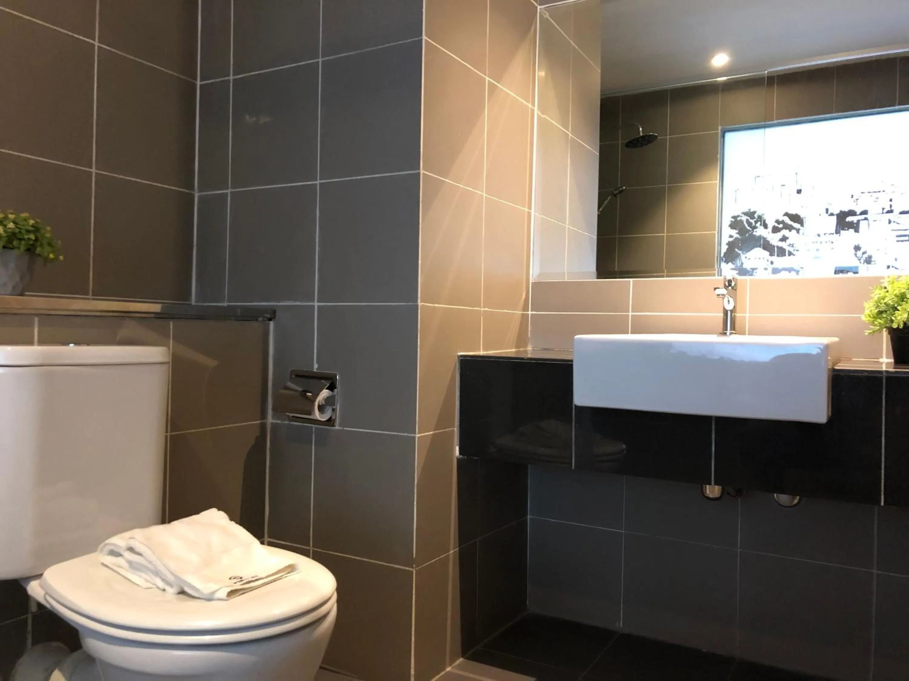 Shower in Aeropod Suites by Calvin