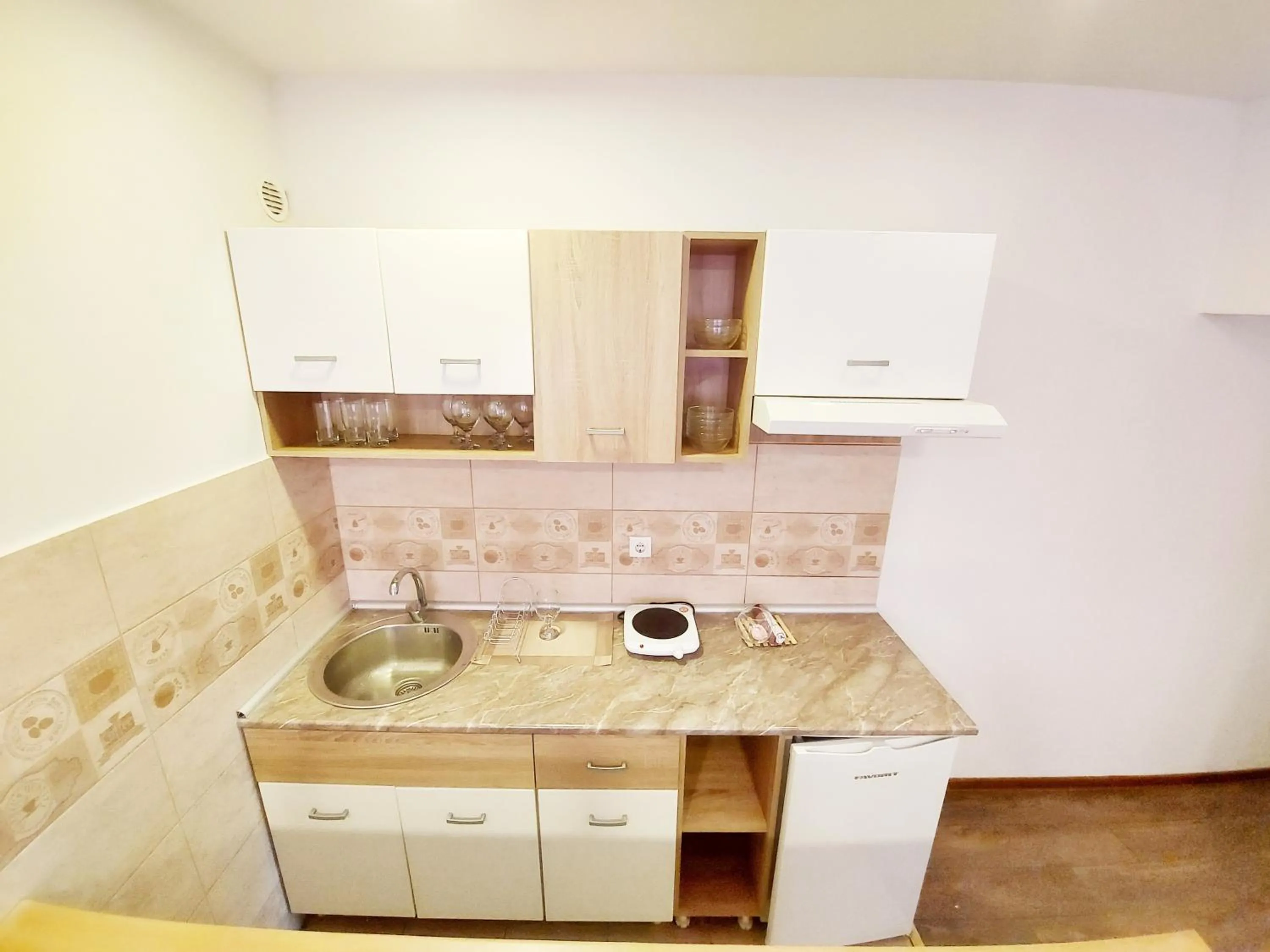 Kitchen or kitchenette in MAGENTA Apartments