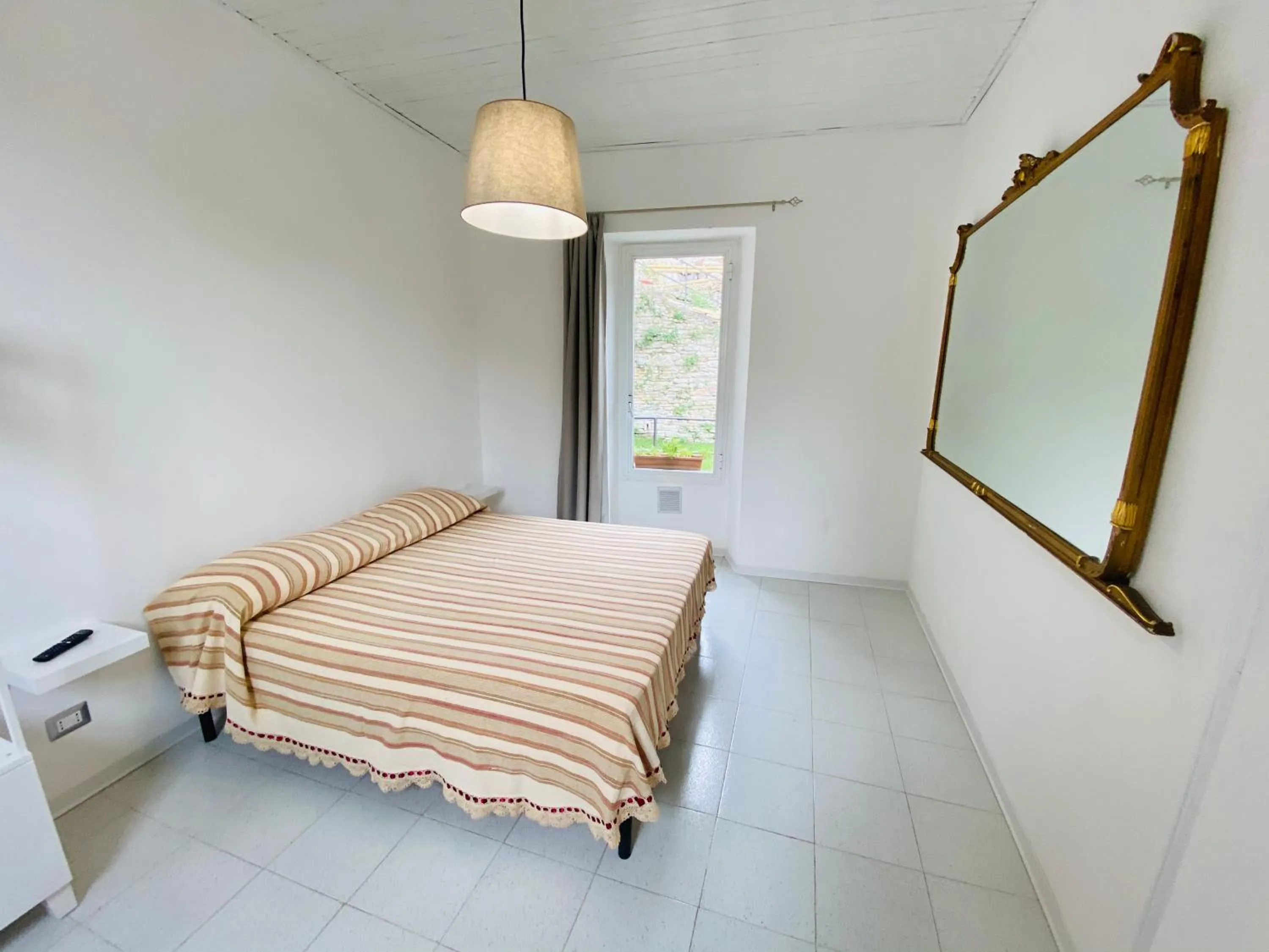 Bed in Il Cavalier Veggiani B&B