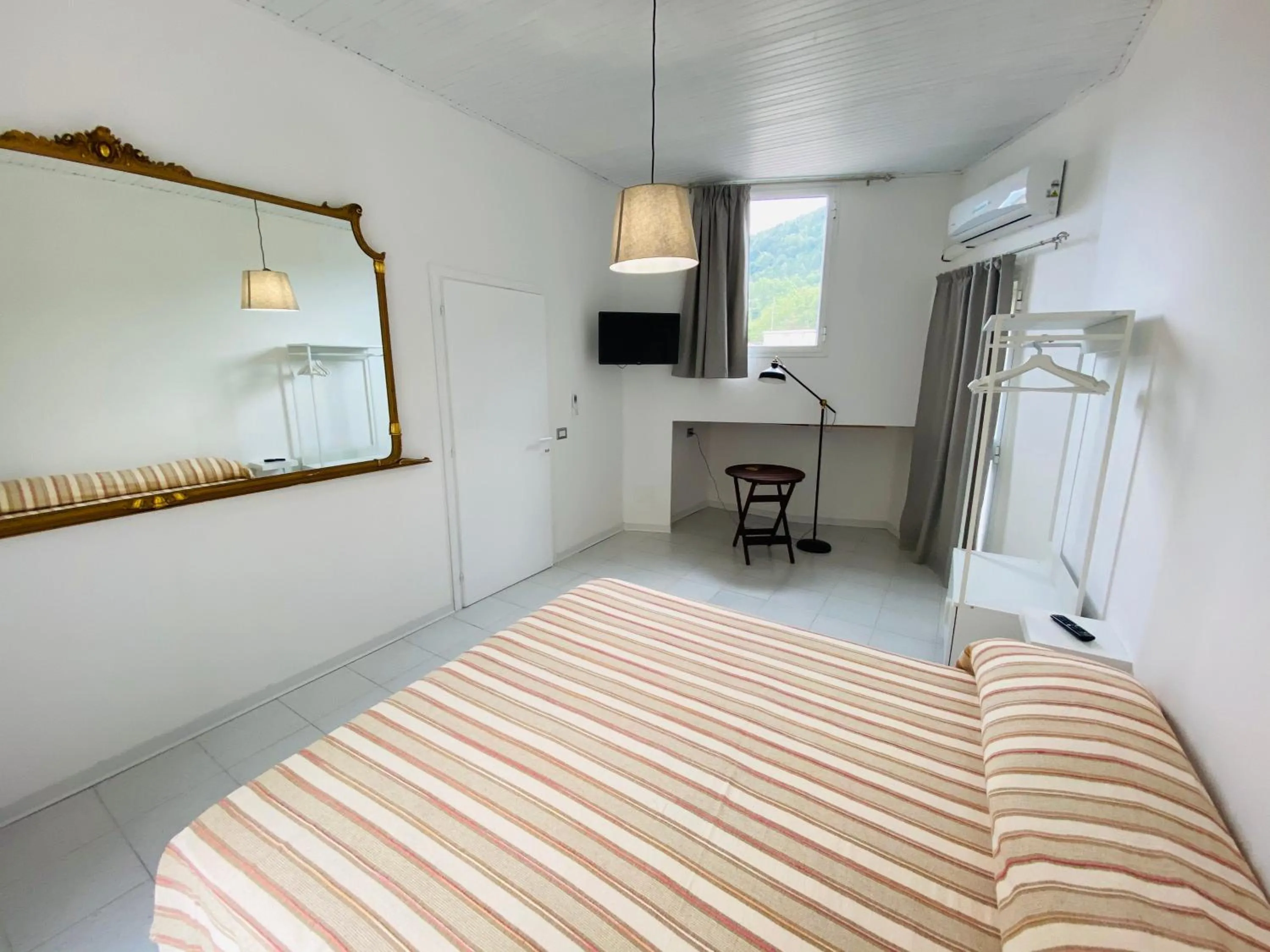 Bed in Il Cavalier Veggiani B&B