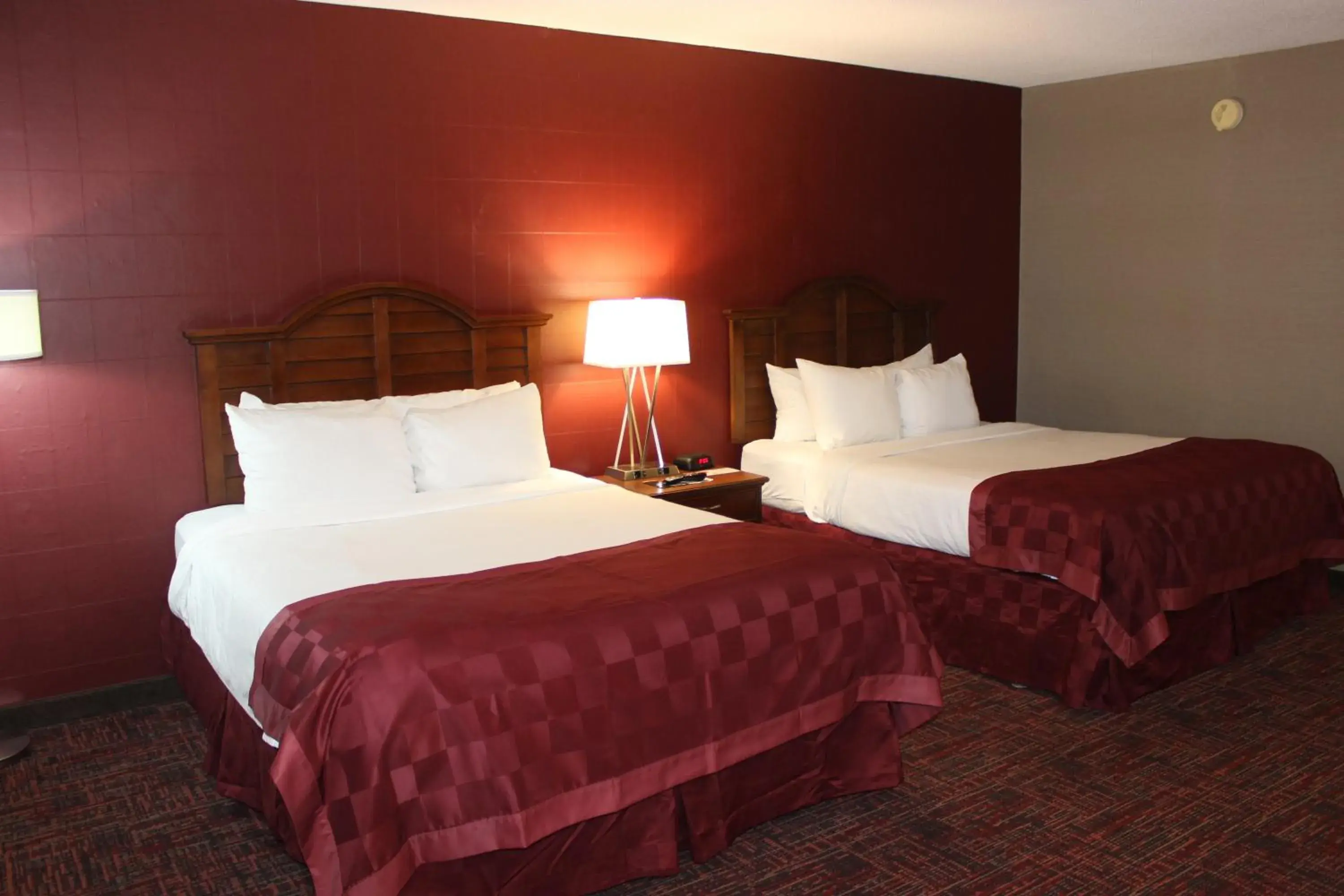 Bed in Ramada by Wyndham Grand Forks Bed in Ramada by Wyndham Grand Forks