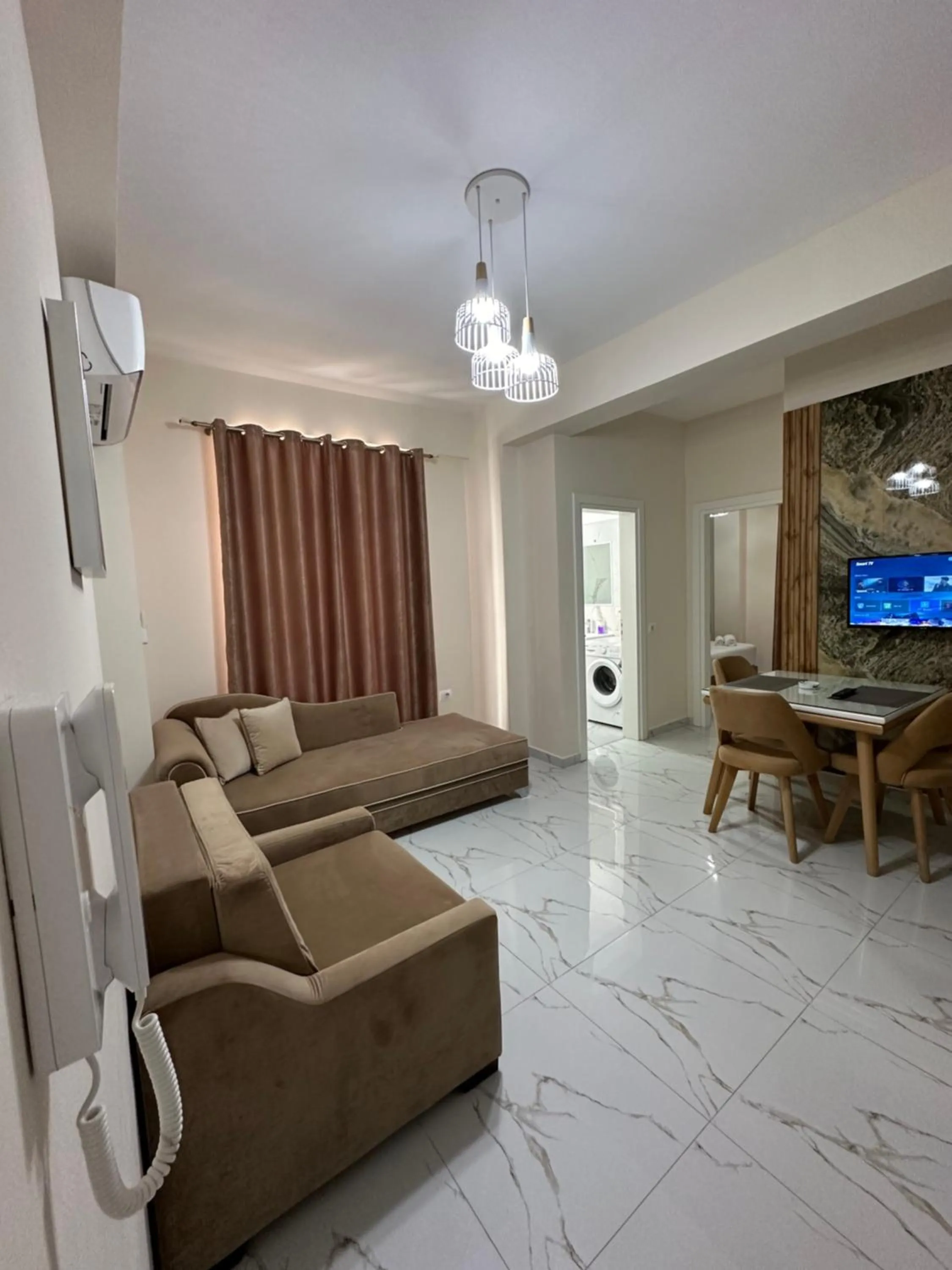 Communal lounge/ TV room in DREAM APARTMENTS Saranda