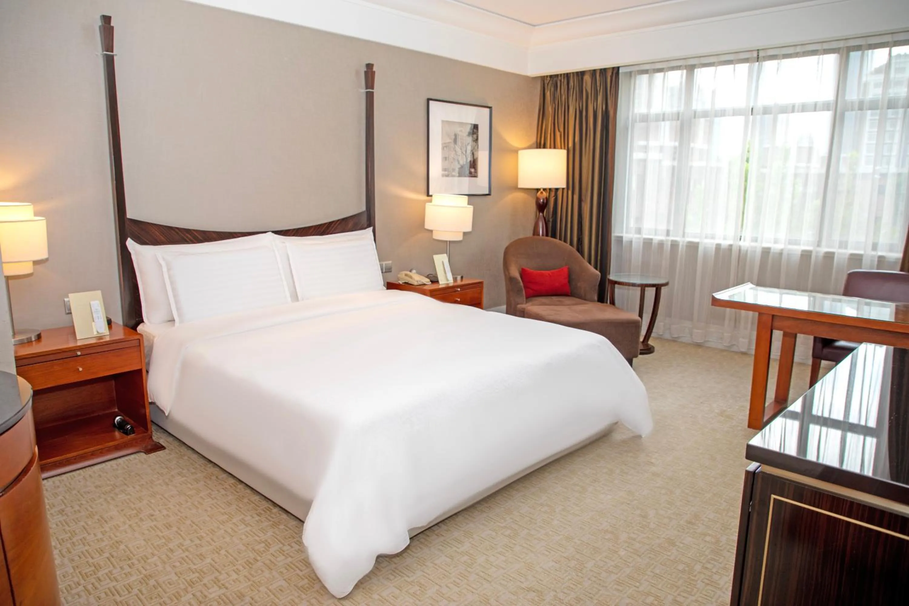 Photo of the whole room, Bed in Jin Jiang Hotel Shanghai - historical hotel in the city-center of Huaihai shopping area and convenient access to metro lines