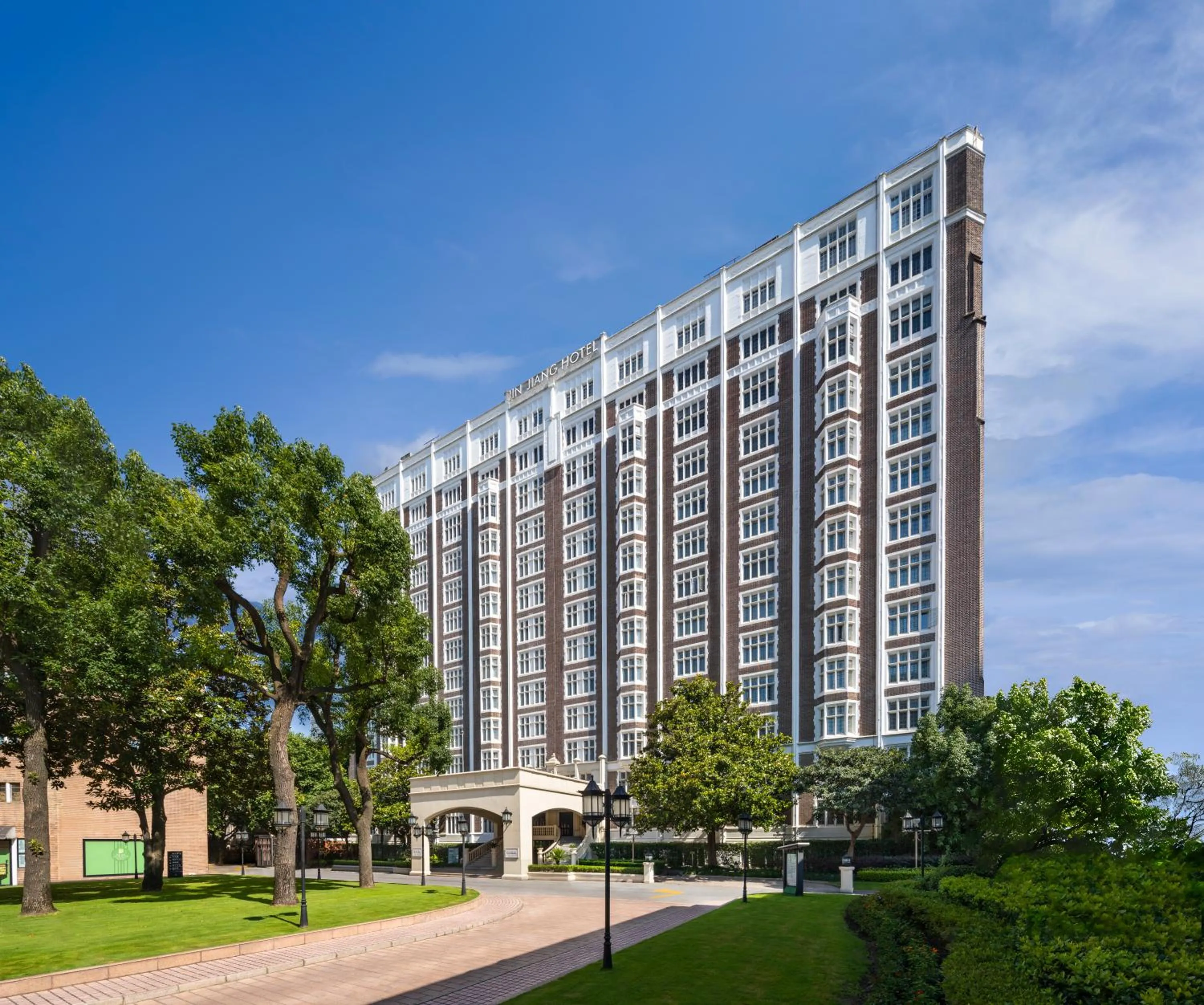 Property building in Jin Jiang Hotel Shanghai - historical hotel in the city-center of Huaihai shopping area and convenient access to metro lines