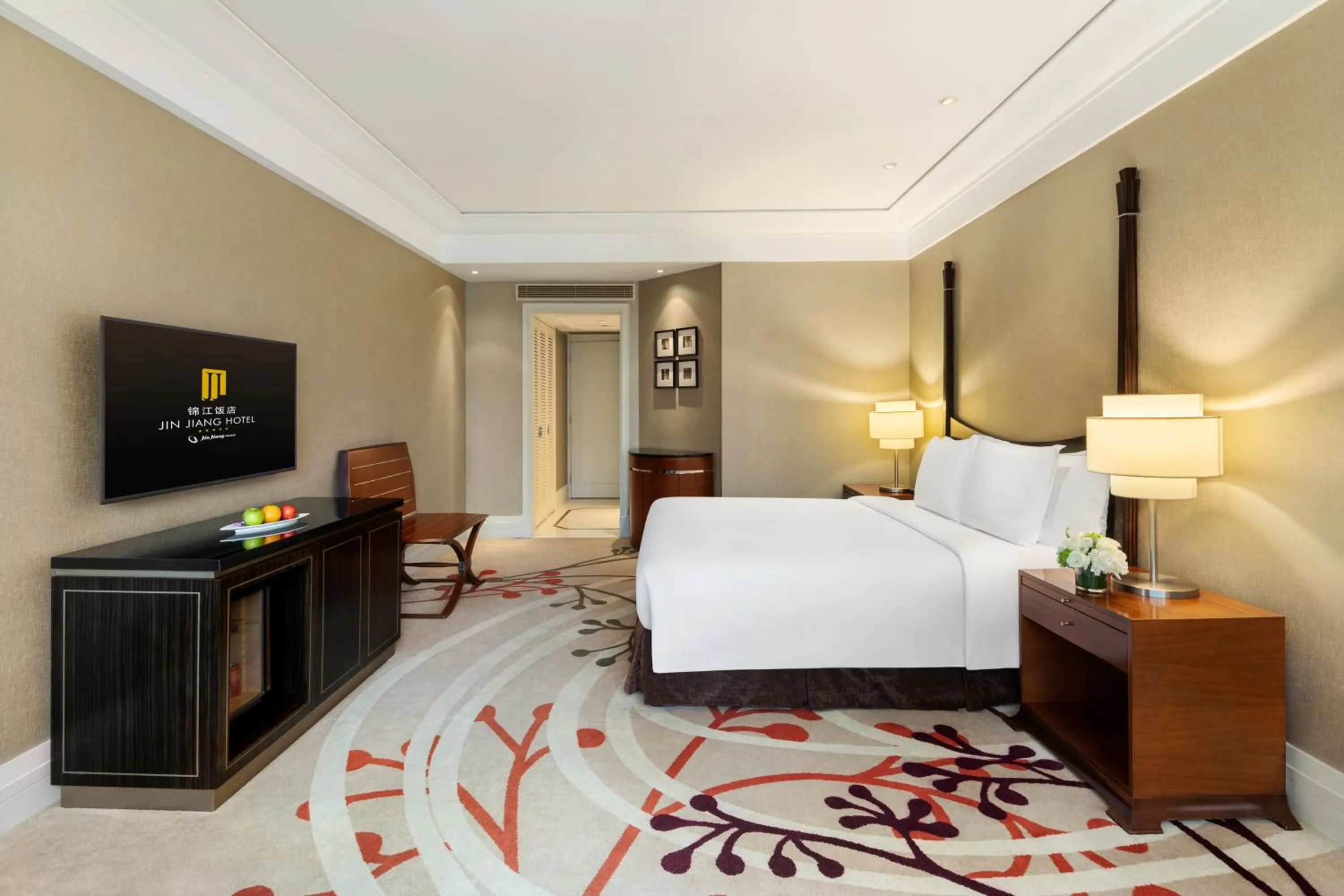 Photo of the whole room, Bed in Jin Jiang Hotel Shanghai - historical hotel in the city-center of Huaihai shopping area and convenient access to metro lines