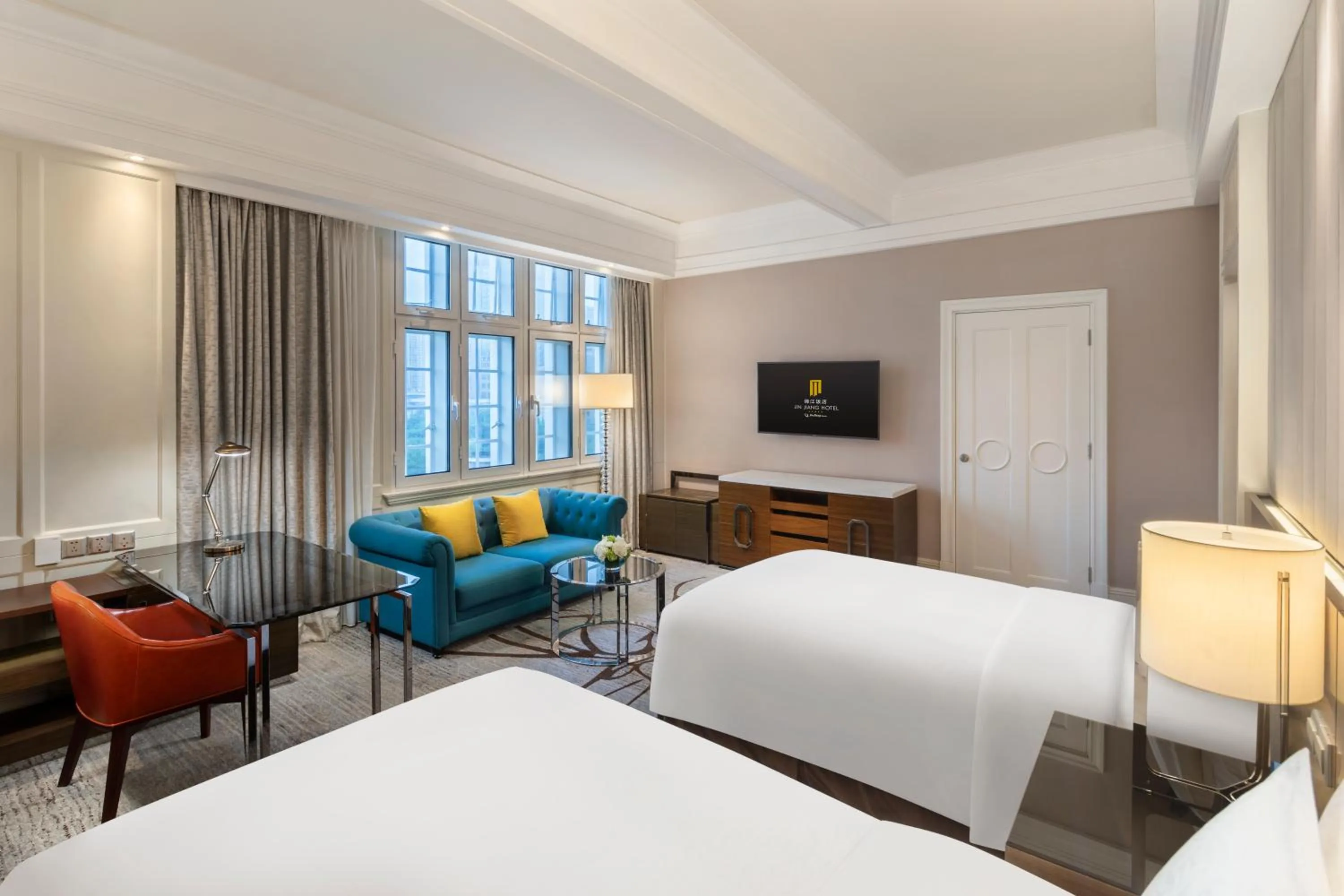 Photo of the whole room, Bed in Jin Jiang Hotel Shanghai - historical hotel in the city-center of Huaihai shopping area and convenient access to metro lines