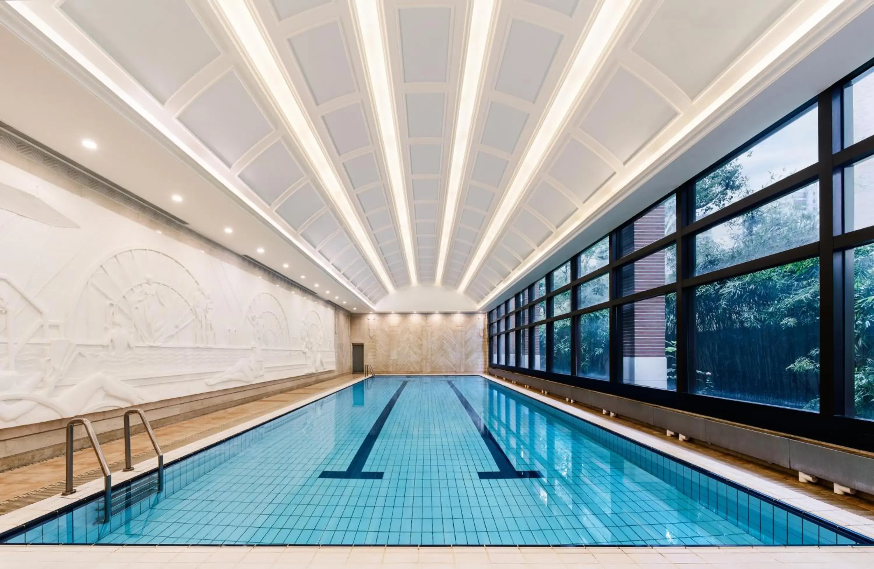 Swimming pool in Jin Jiang Hotel Shanghai - historical hotel in the city-center of Huaihai shopping area and convenient access to metro lines Swimming pool in Jin Jiang Hotel Shanghai - historical hotel in the city-center of Huaihai shopping area and convenient access to metro lines