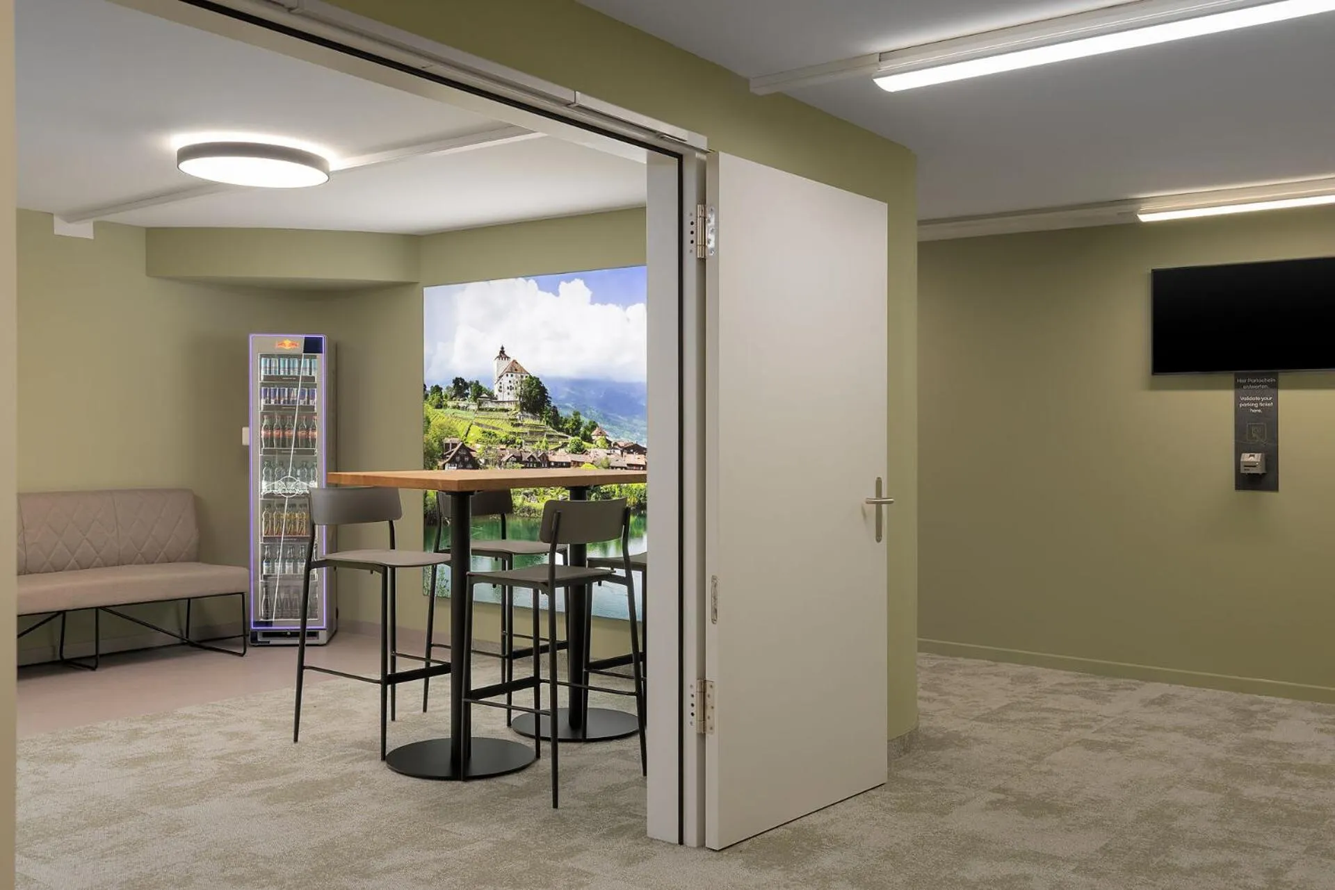 Communal lounge/ TV room in flexymotel Buchs