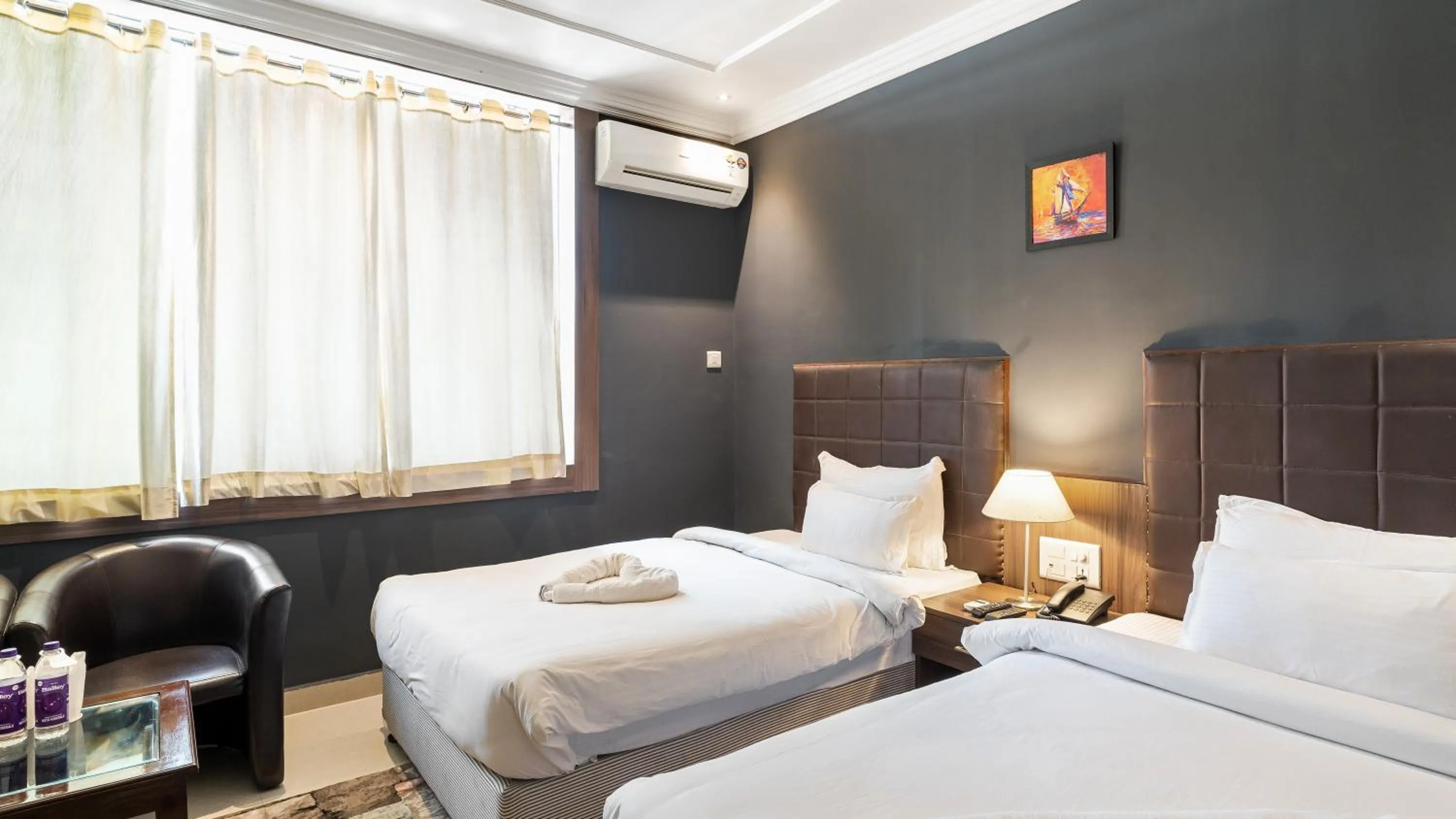 Bed in Niranjana Hotel Bodhgaya