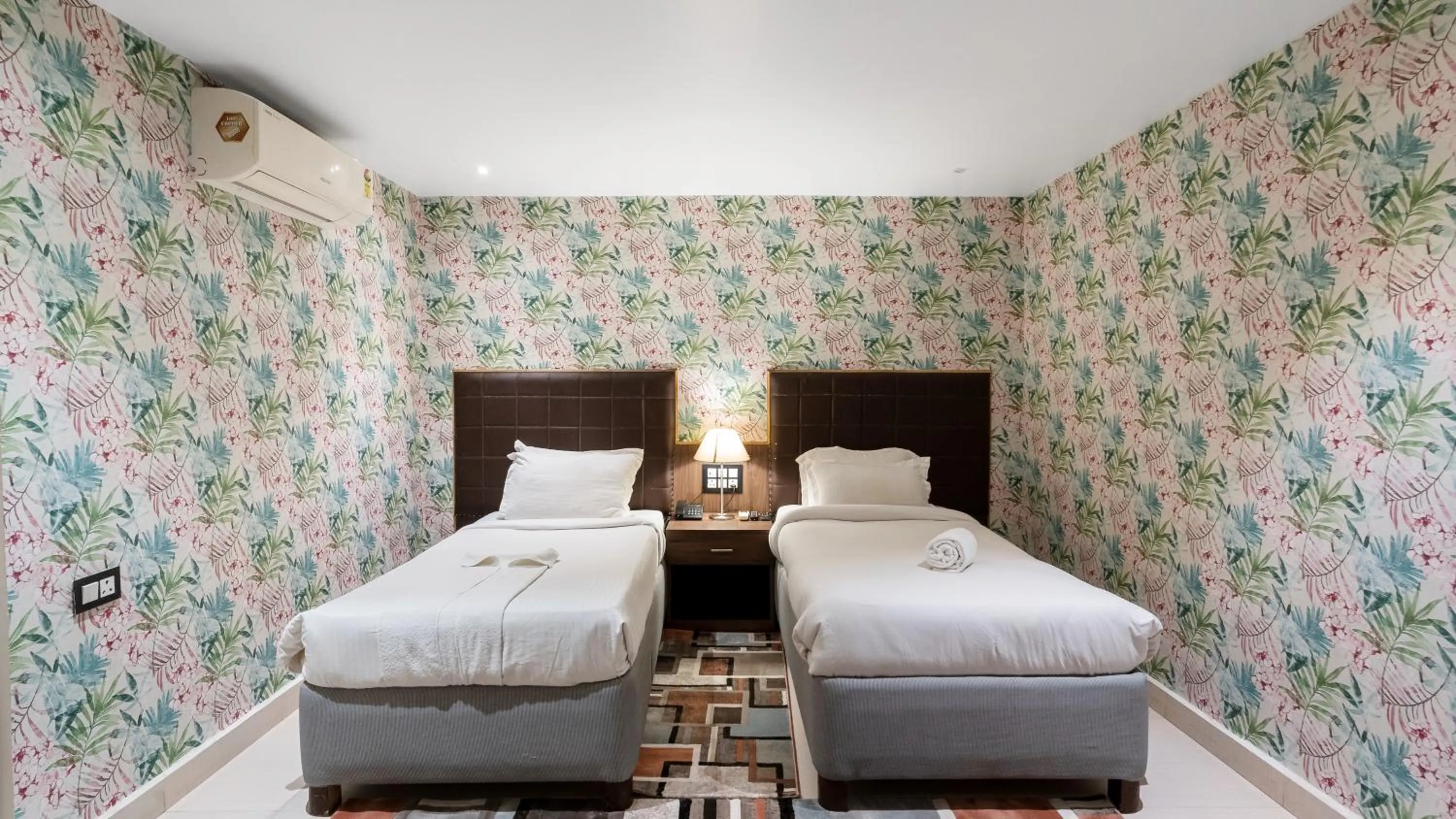 Bed in Niranjana Hotel Bodhgaya