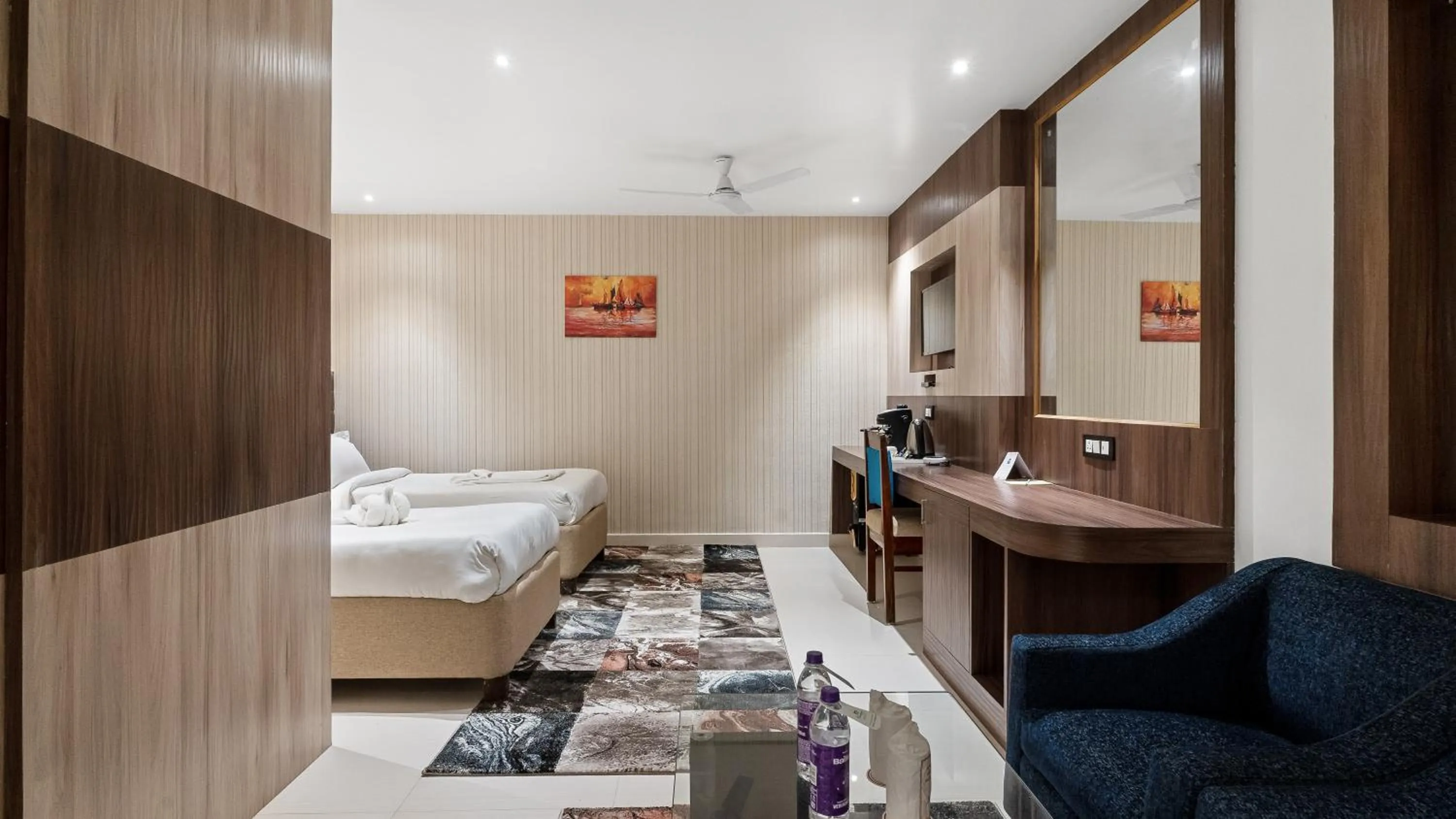 fireplace, Bed in Niranjana Hotel Bodhgaya