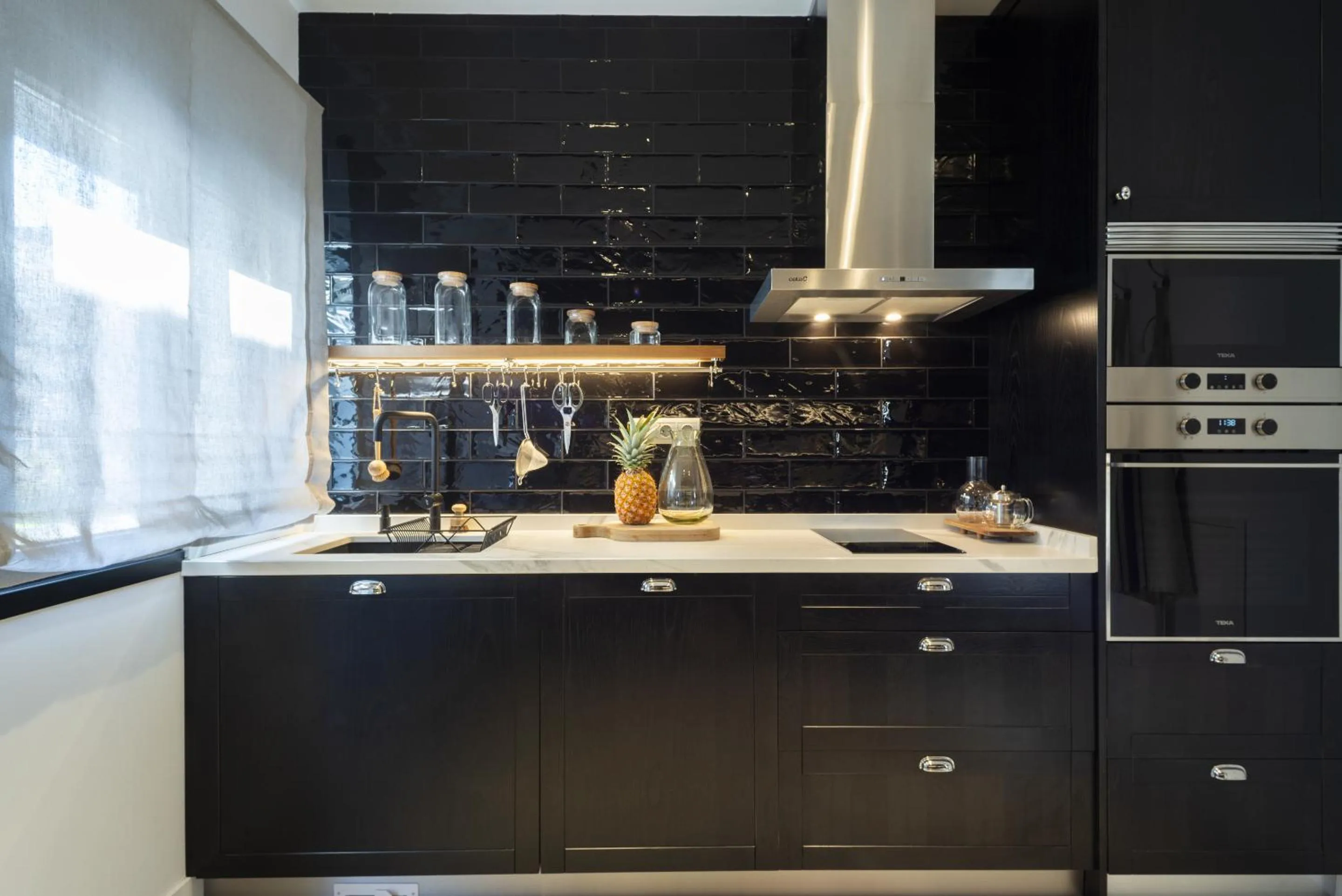 Kitchen or kitchenette in La Playa Suites Suances