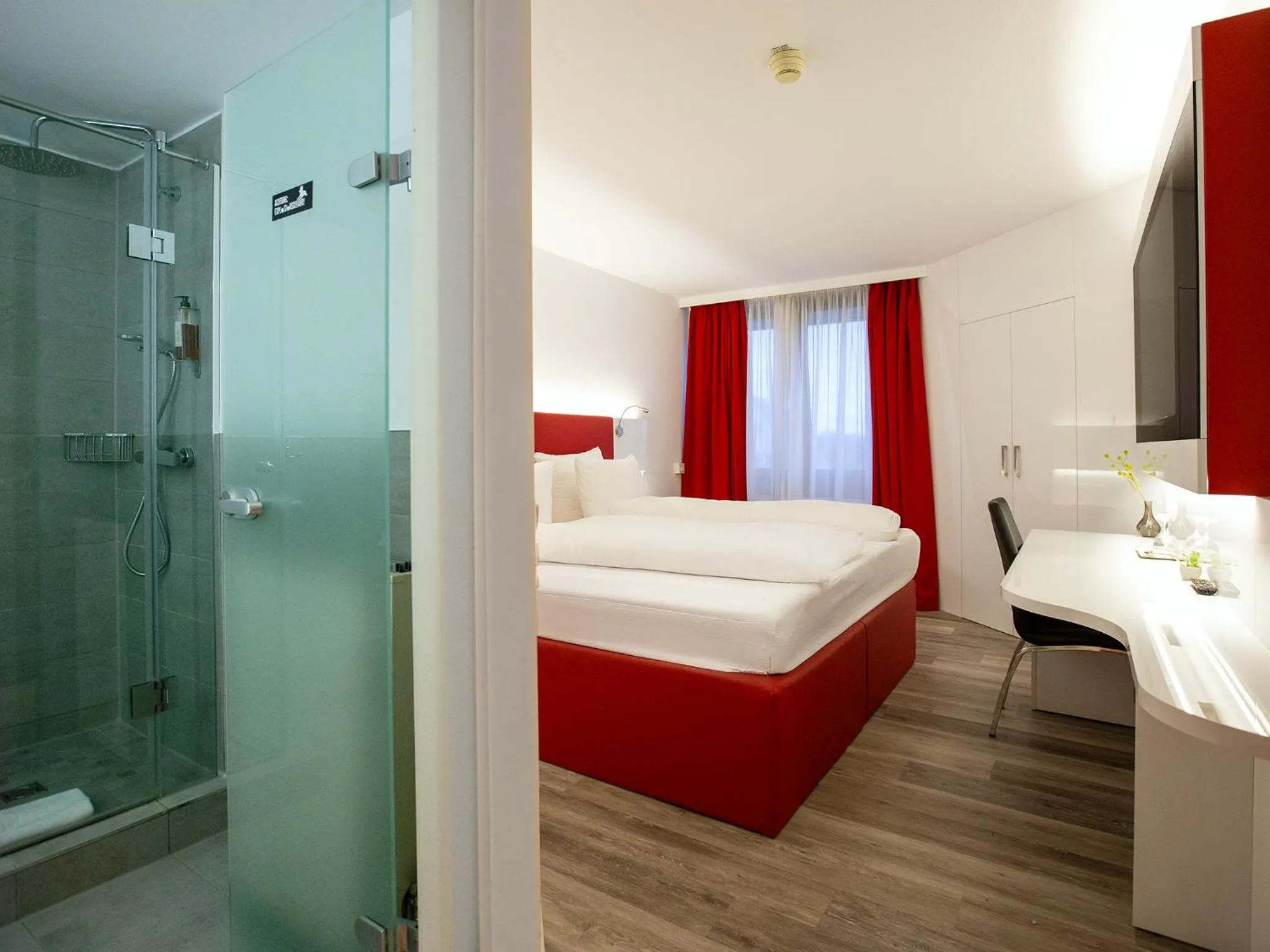 Photo of the whole room, Bed in DORMERO Hotel Düsseldorf