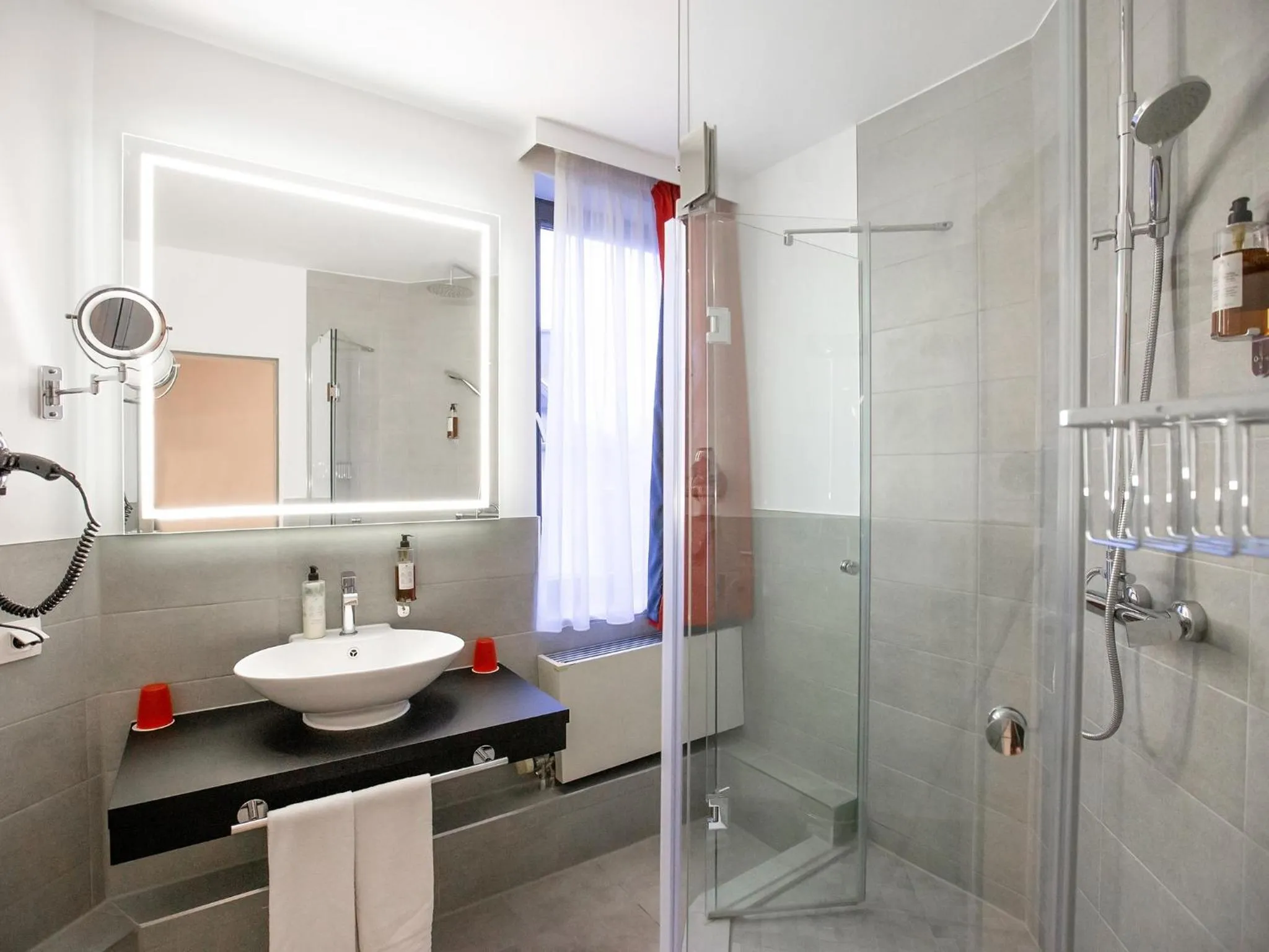 Bathroom in DORMERO Hotel Düsseldorf