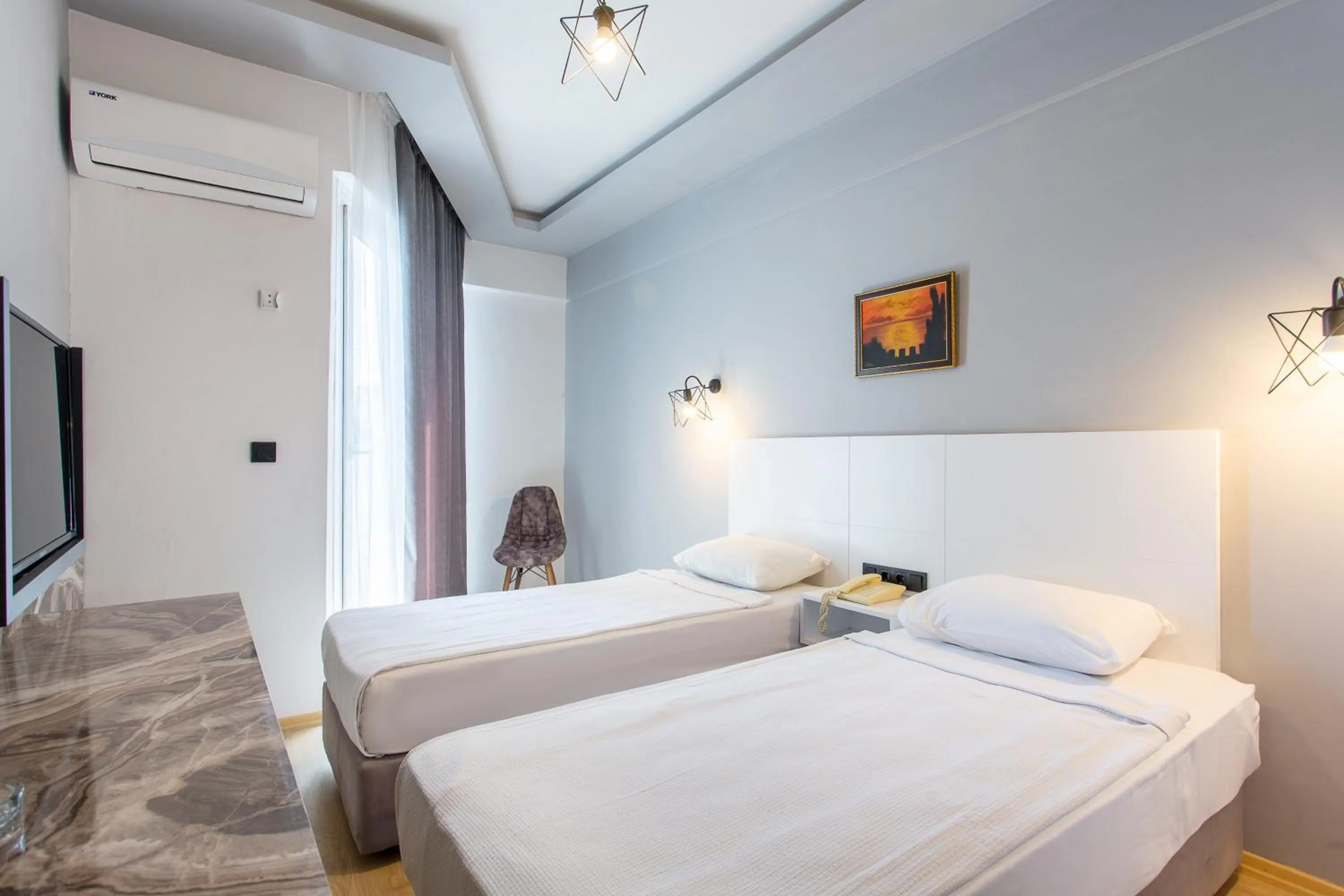 Bed in Aslan Sand & City Hotel