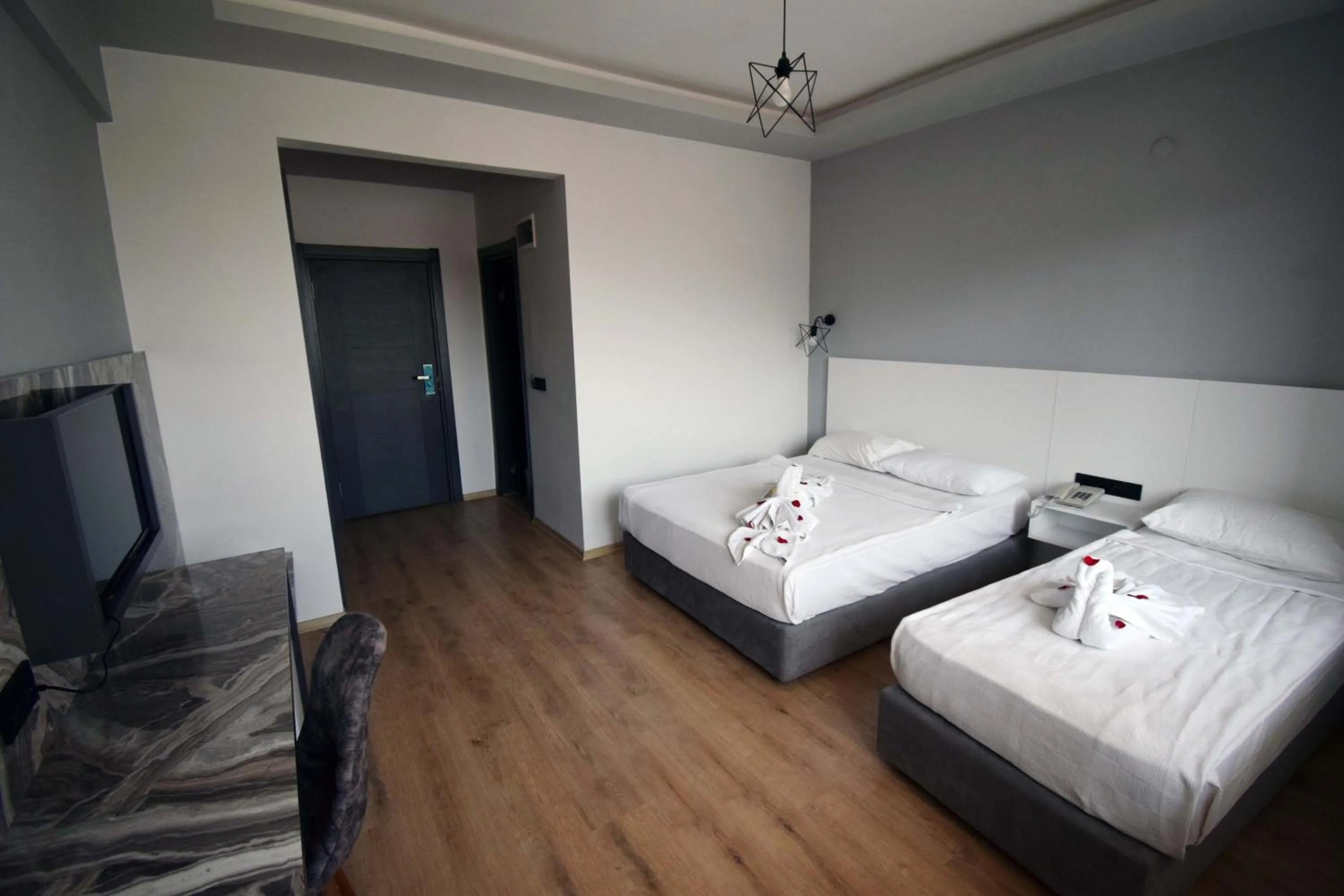 Bed in Aslan Sand & City Hotel