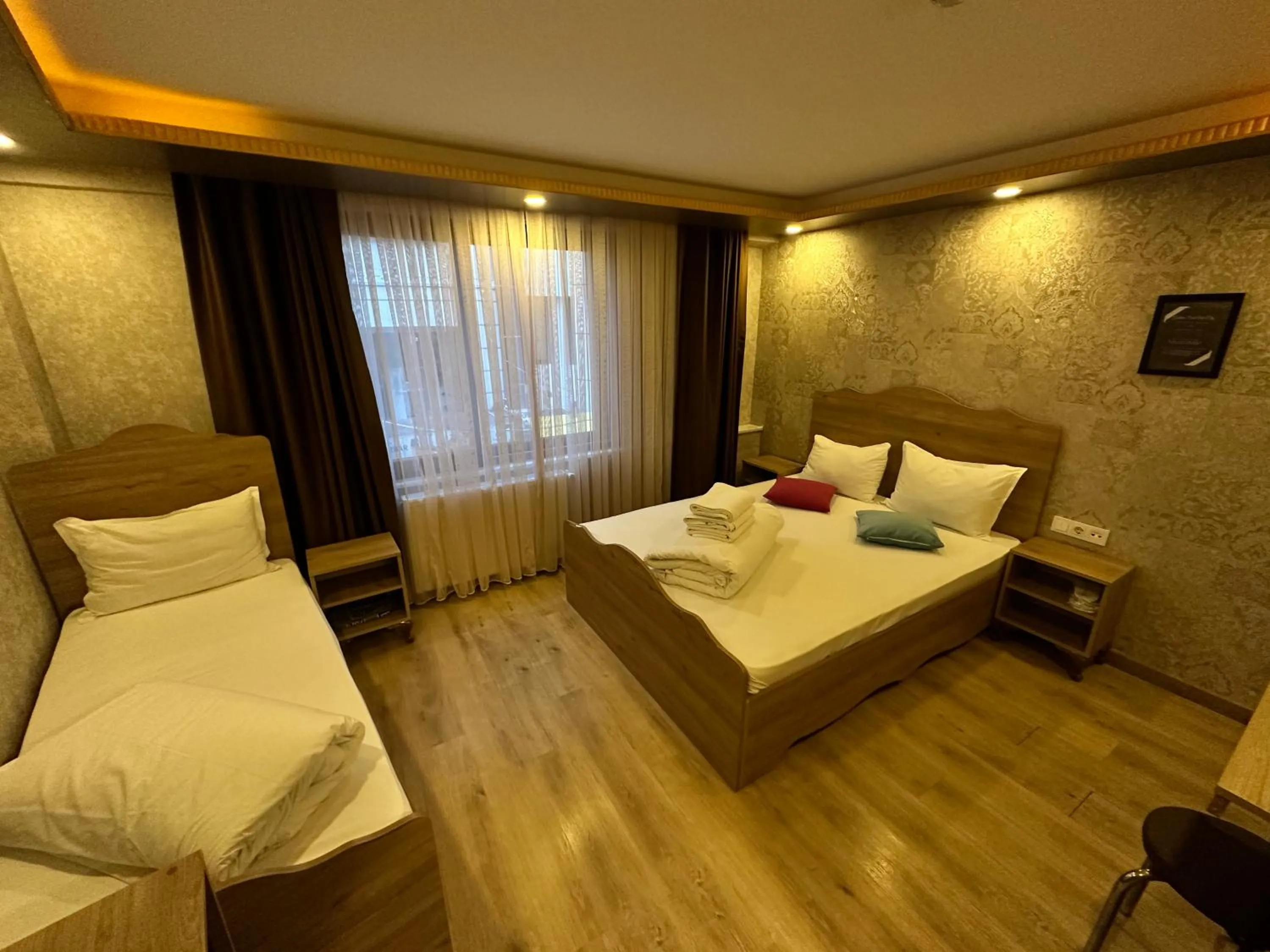 Bed in Golden Sail Hotel Old City