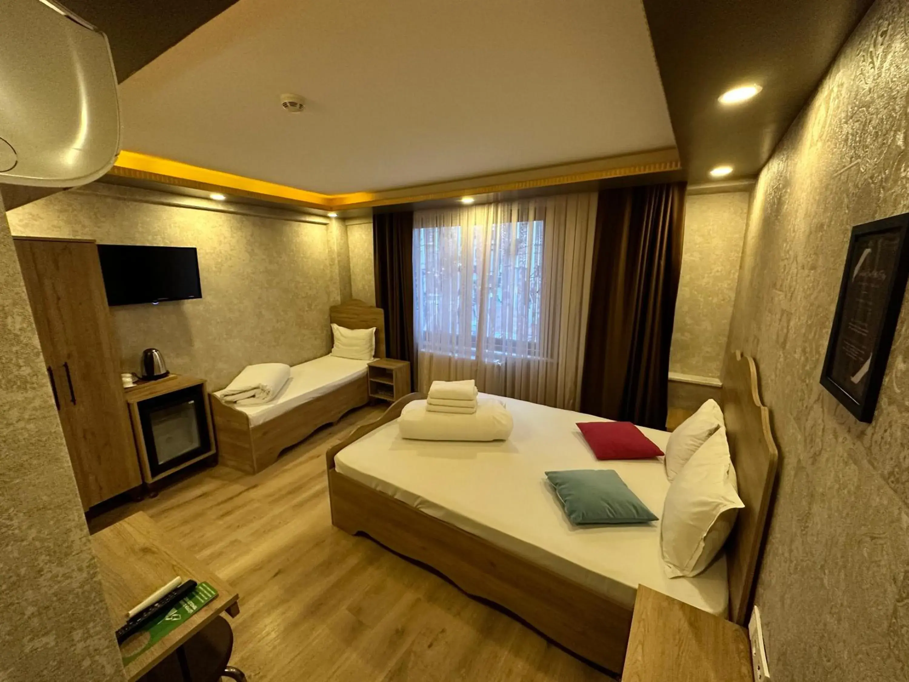 Communal lounge/ TV room, Bed in Golden Sail Hotel Old City Communal lounge/ TV room, Bed in Golden Sail Hotel Old City