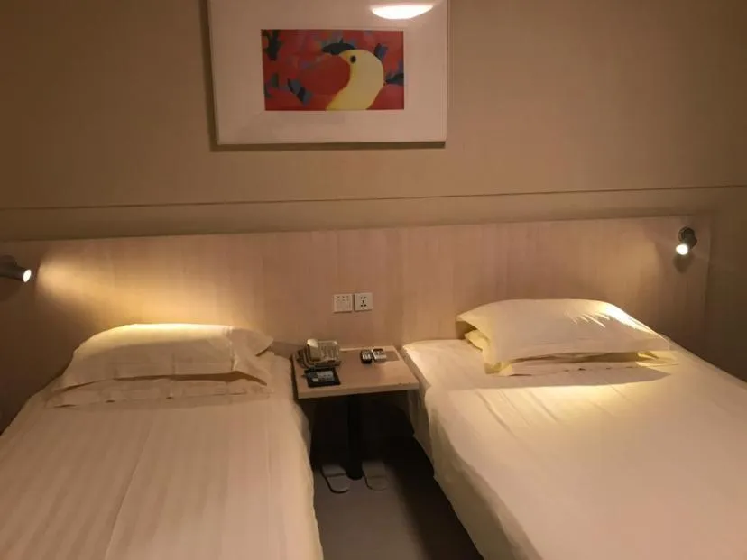 Bed in Jinjiang Inn Xuzhou Xinyi Municipal Government