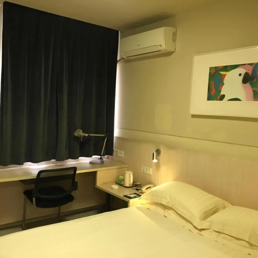 Bed in Jinjiang Inn Xuzhou Xinyi Municipal Government
