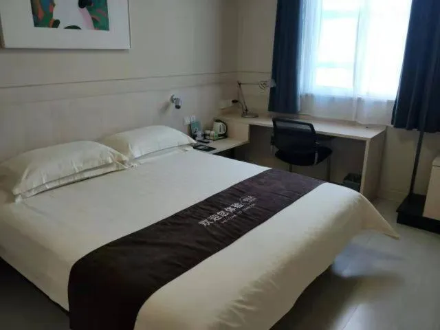 Bed in Jinjiang Inn Xuzhou Xinyi Municipal Government