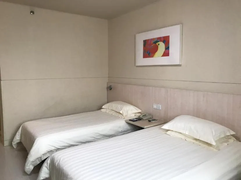 Bed in Jinjiang Inn Xuzhou Xinyi Municipal Government