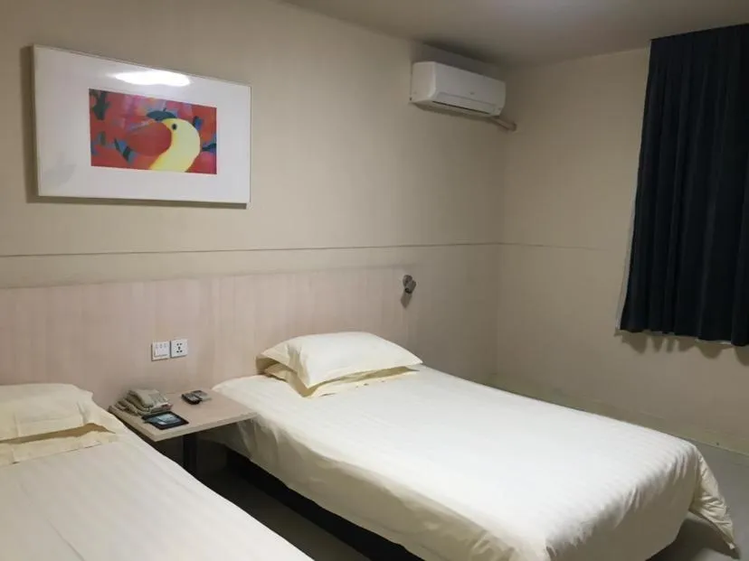 Bed in Jinjiang Inn Xuzhou Xinyi Municipal Government