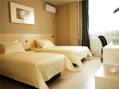 Bed in Jinjiang Inn Yingkou Port Authority Bayuquan Century Plaza