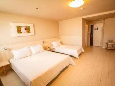Bed in Jinjiang Inn Yingkou Port Authority Bayuquan Century Plaza