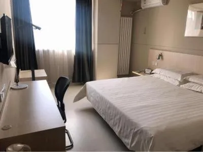 Bed in Jinjiang Inn Yingkou Port Authority Bayuquan Century Plaza