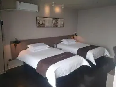 Bed in Jinjiang Inn Select Xuzhou High-speed Railway Huaihai Huanqiugang Branch Bed in Jinjiang Inn Select Xuzhou High-speed Railway Huaihai Huanqiugang Branch