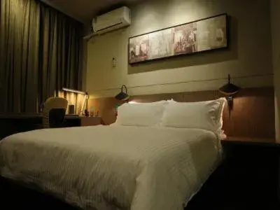 Bed in JinJiang Inn WenZhouNan Railway Station Xinqiao Bed in JinJiang Inn WenZhouNan Railway Station Xinqiao