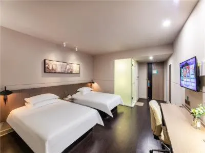 Bed in JinJiang InnSelect Suzhou Shengze Shunhuxilu Hotel