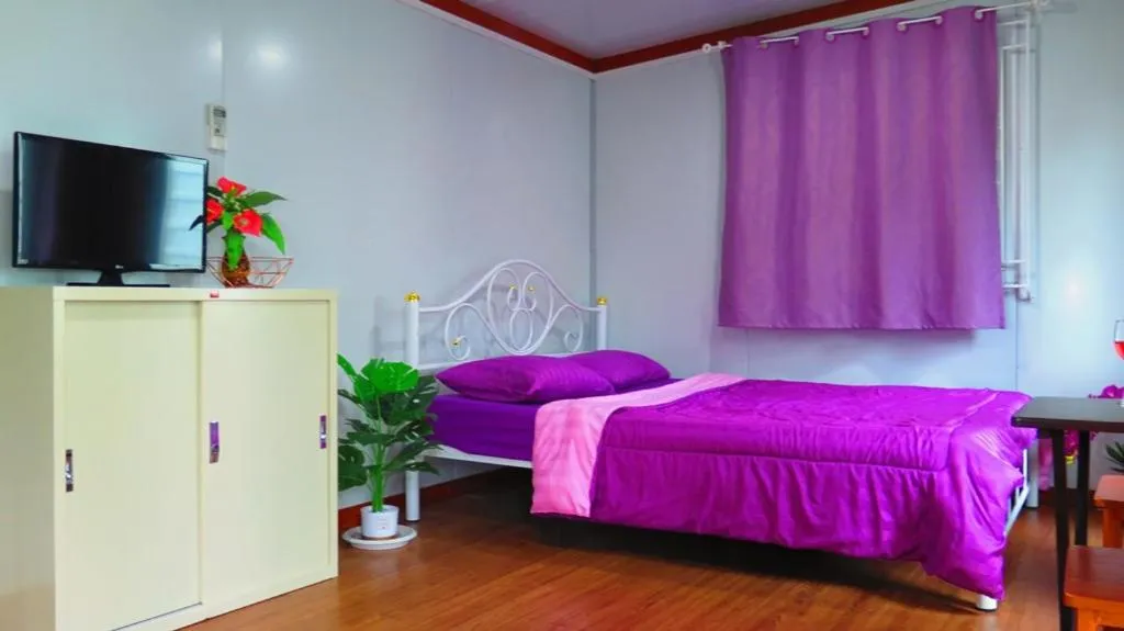 Bed in Pranot Apartment & Spa