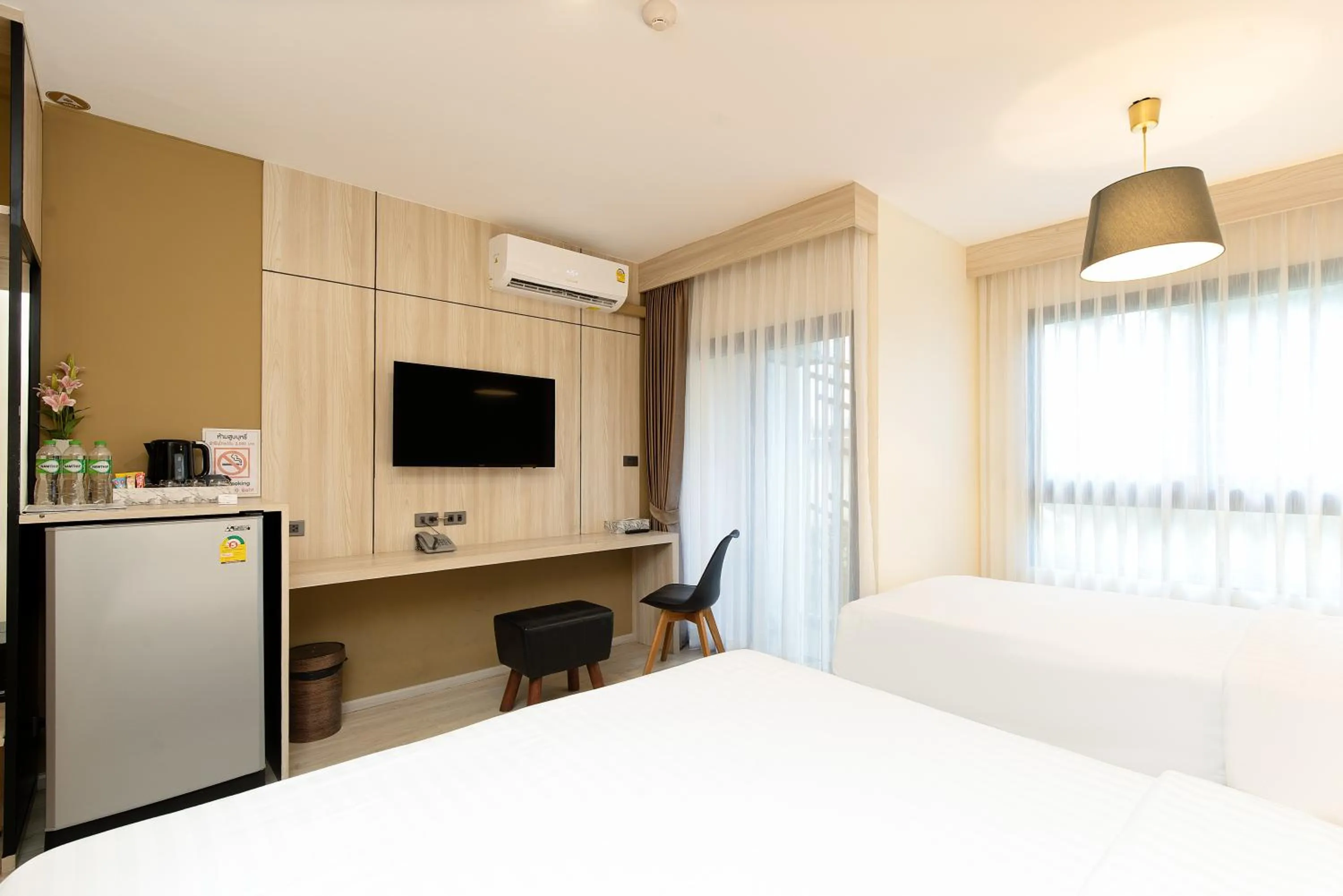 Bed in Amanah Bangkok Hotel