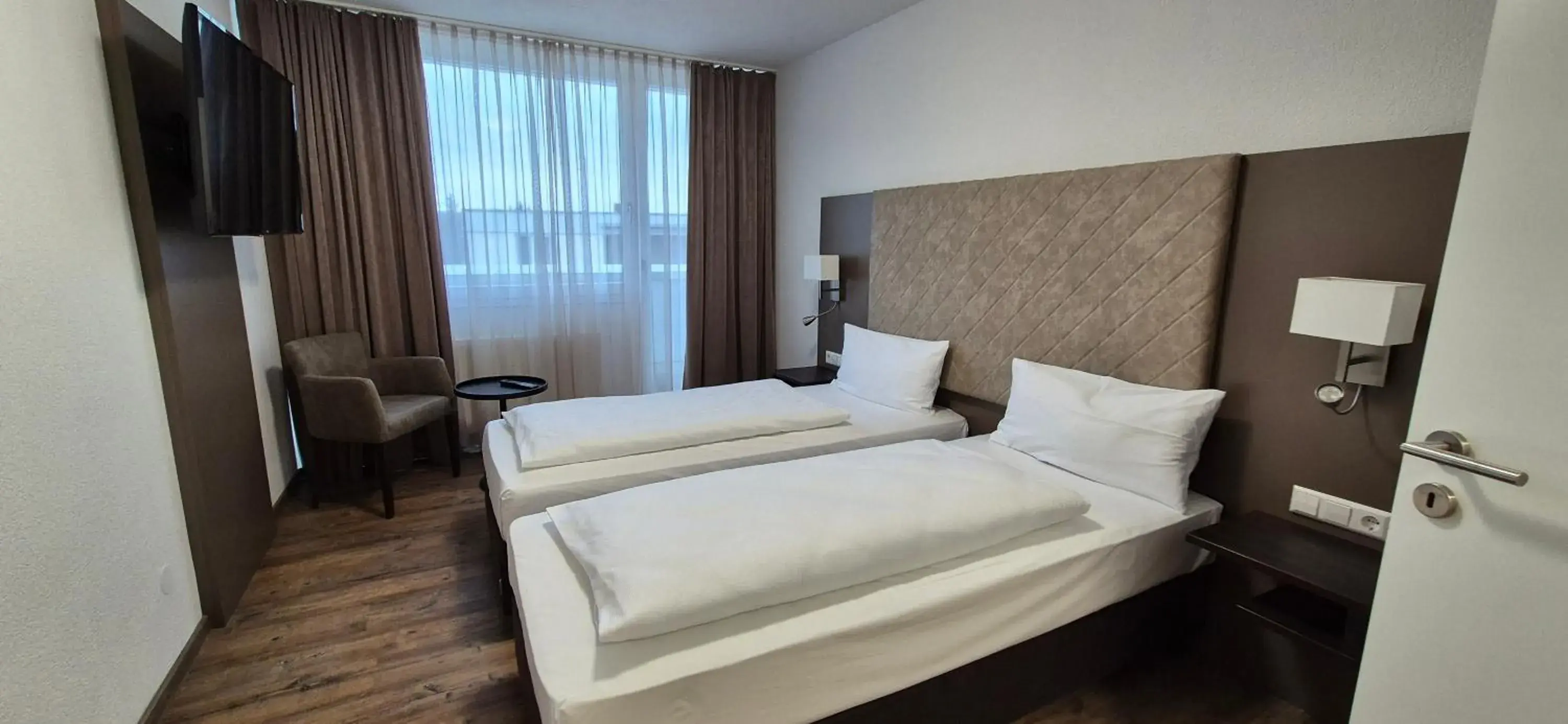 Bed in Melvi Hotel Göppingen Bed in Melvi Hotel Göppingen