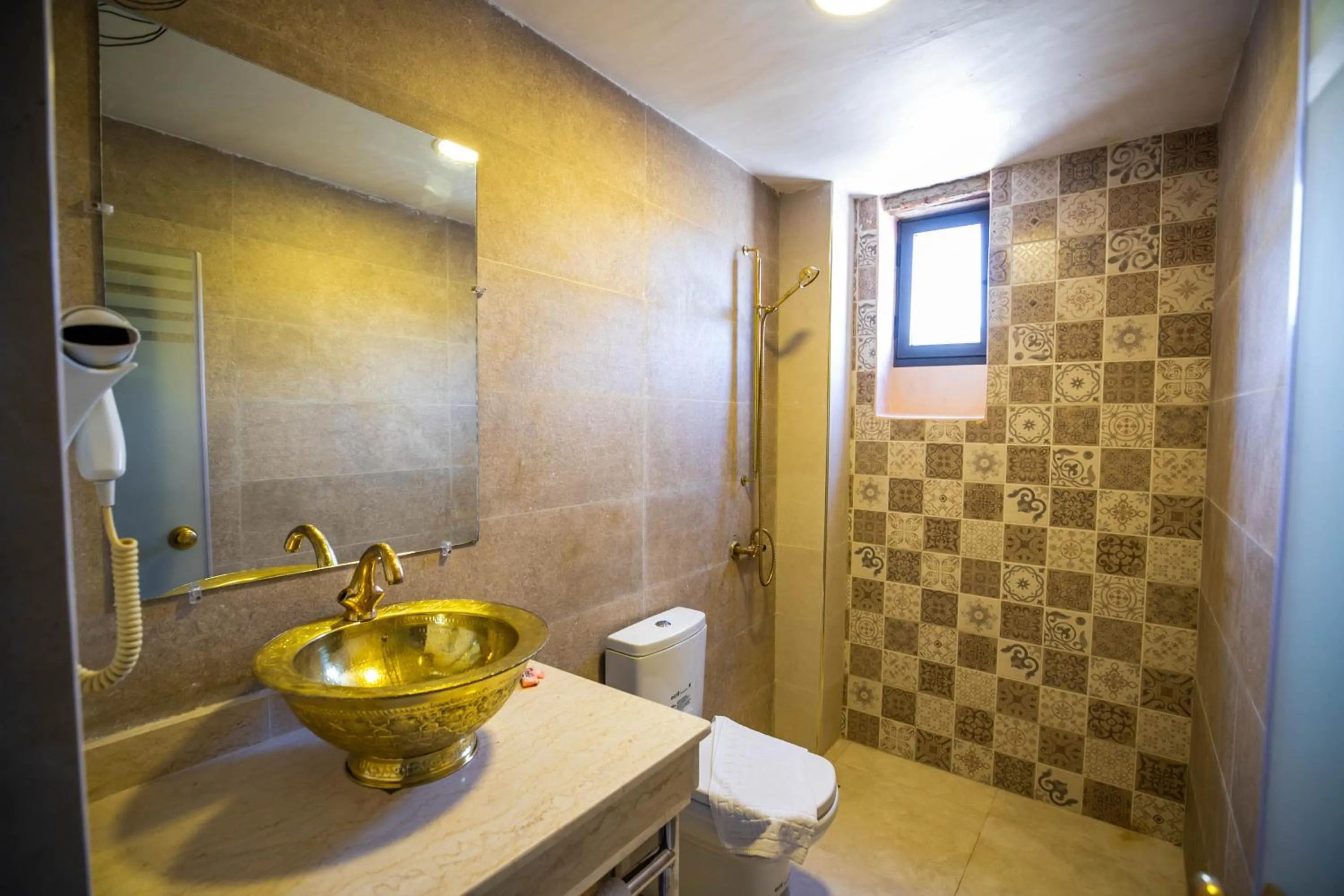 Bathroom in Palais Shazam & SPA