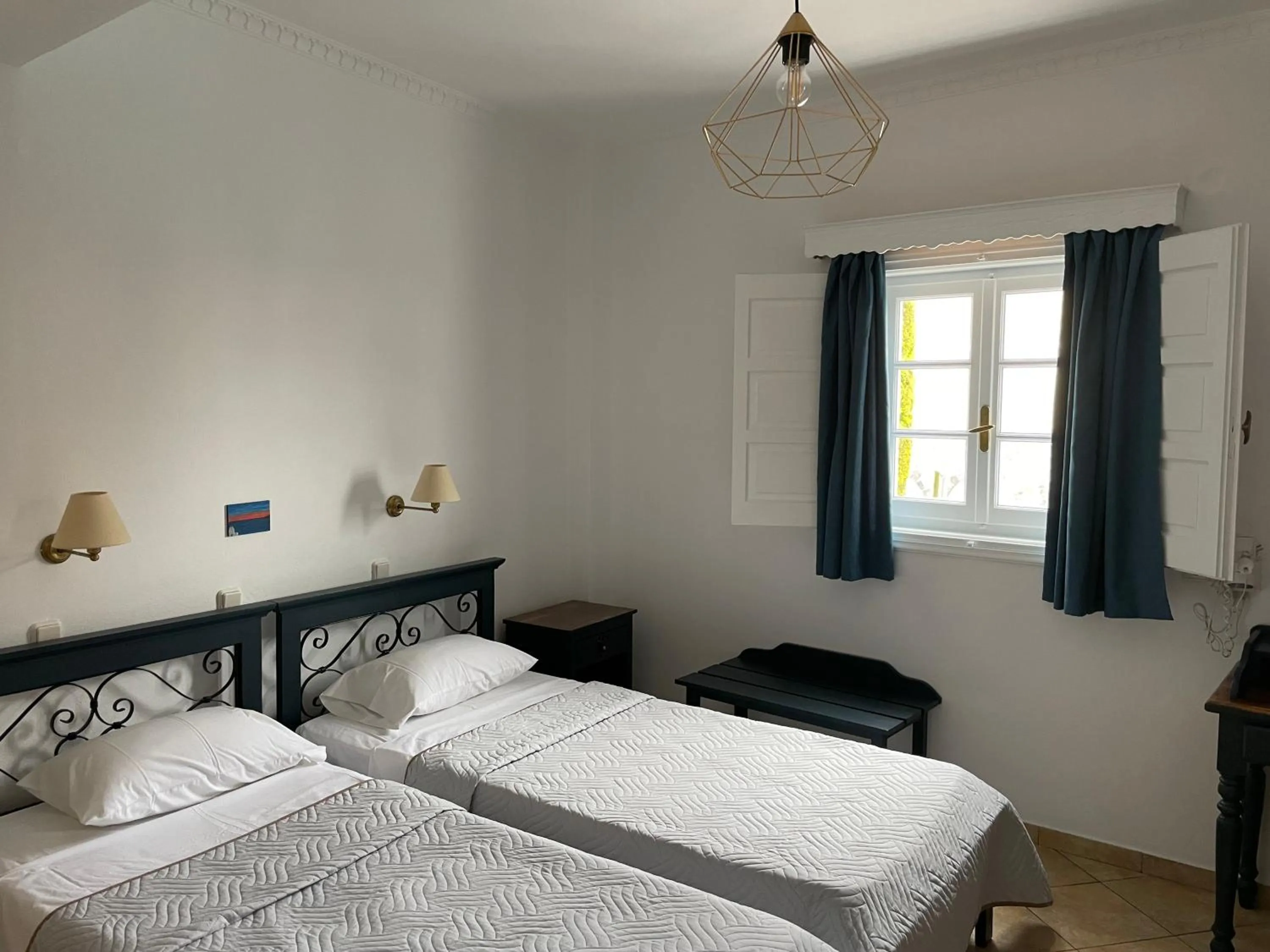 Bed in Leonidas Apartments