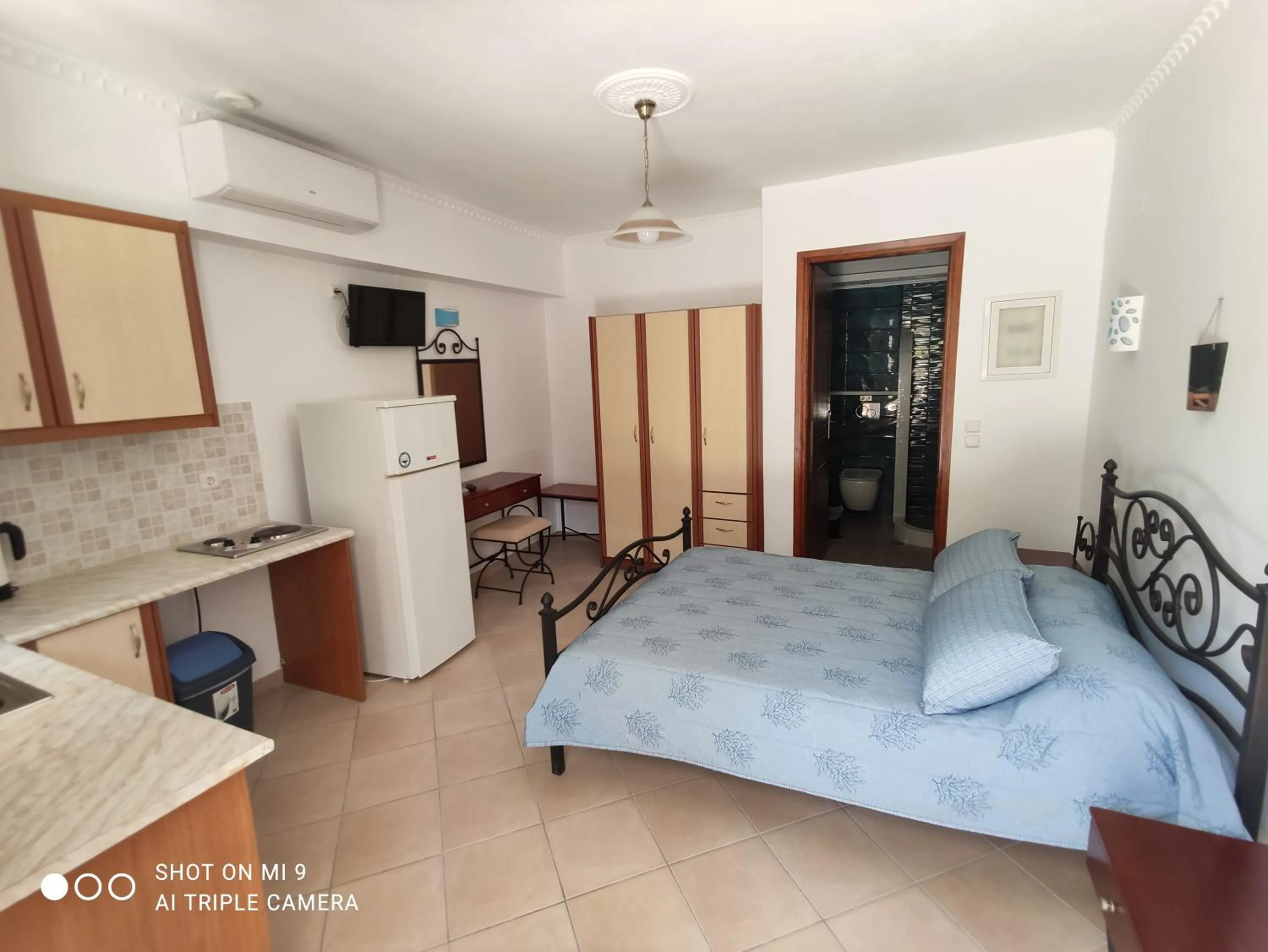 Bed in Leonidas Apartments