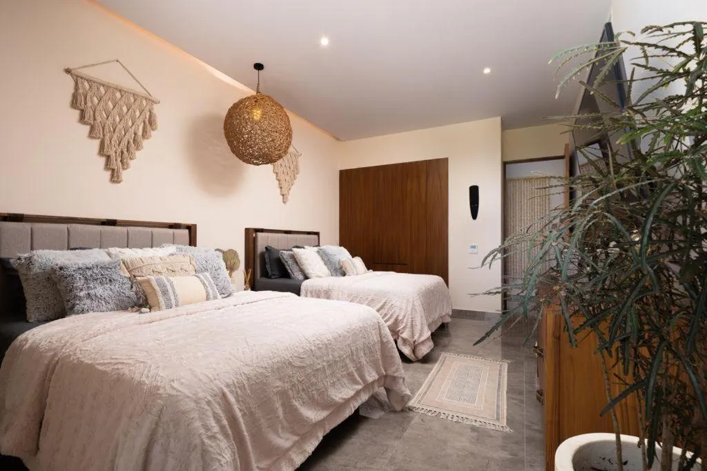 Photo of the whole room, Bed in Mistiq Tulum