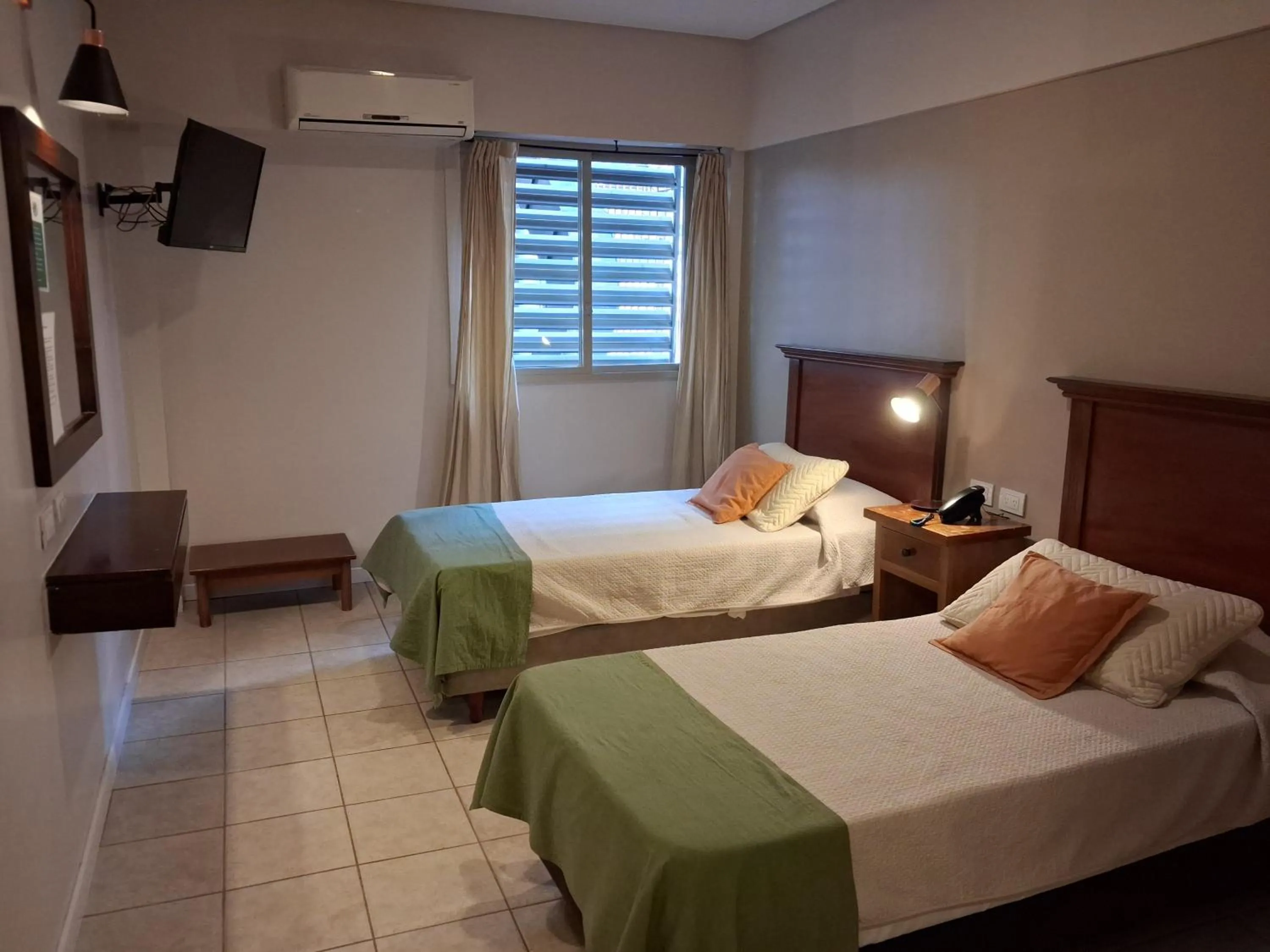 Bed in Esmeralda Palace Hotel