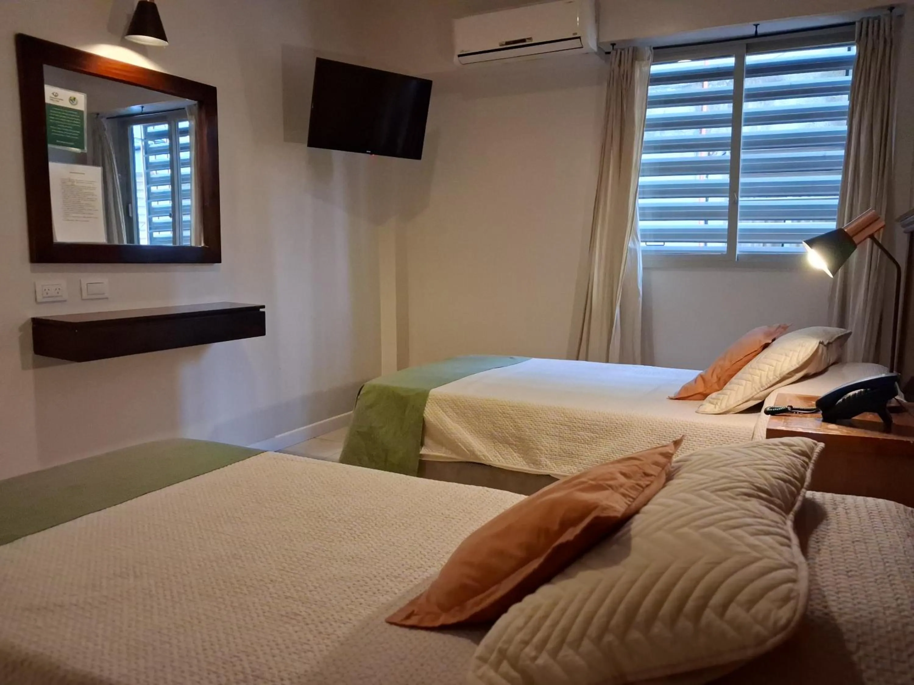 Bed in Esmeralda Palace Hotel