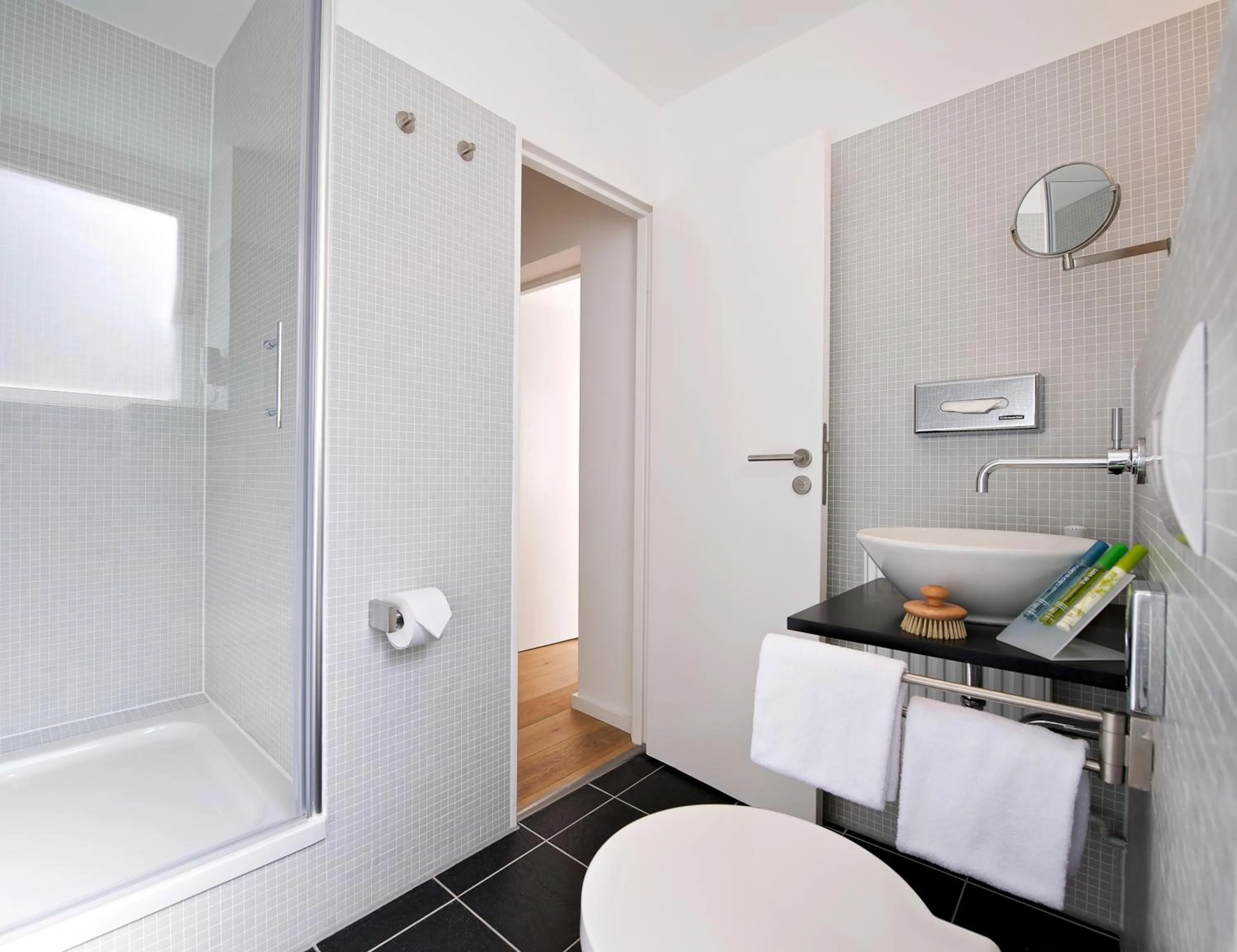 Bathroom in Art'Appart Suiten - kontaktloser Check-In