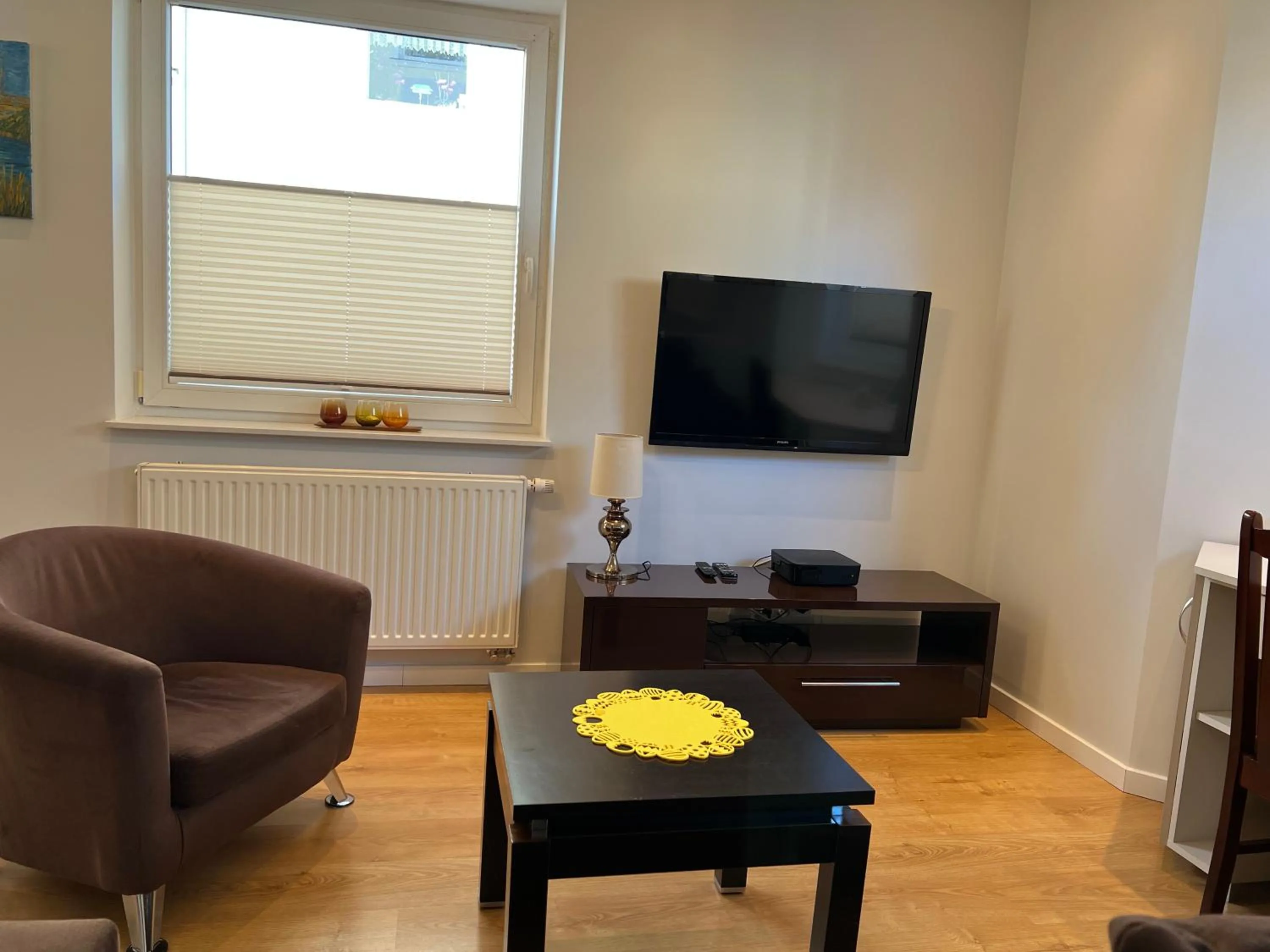 Communal lounge/ TV room in Apartament Morska Przystan