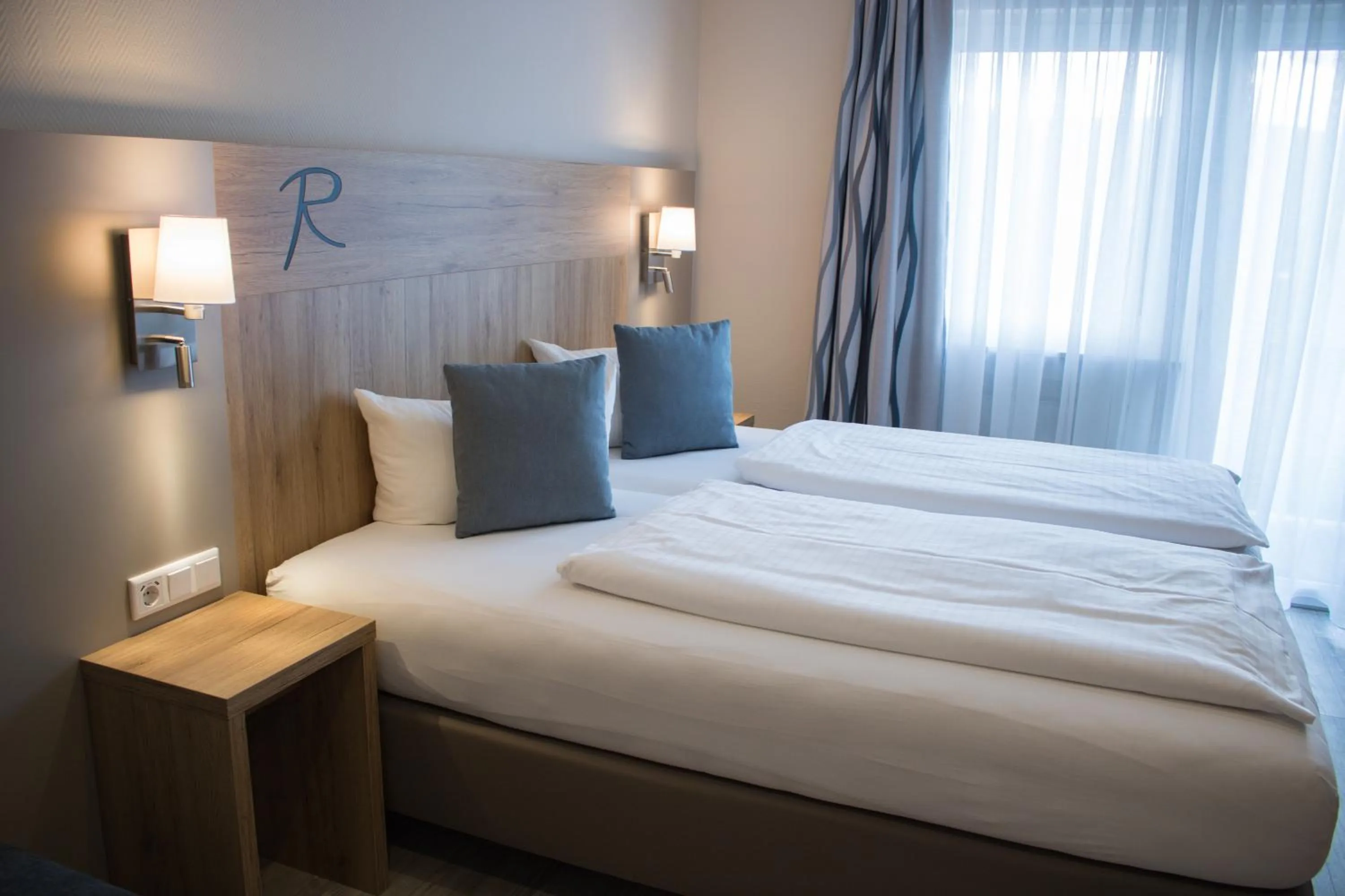 Bed in Hotel Rosenbusch