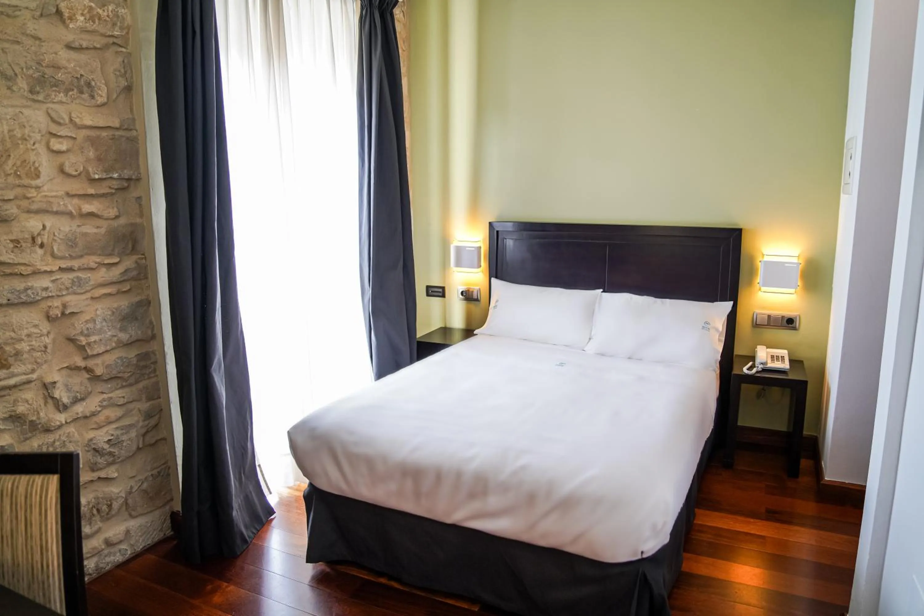 Bed in Hotel Baeza Monumental by eme hoteles